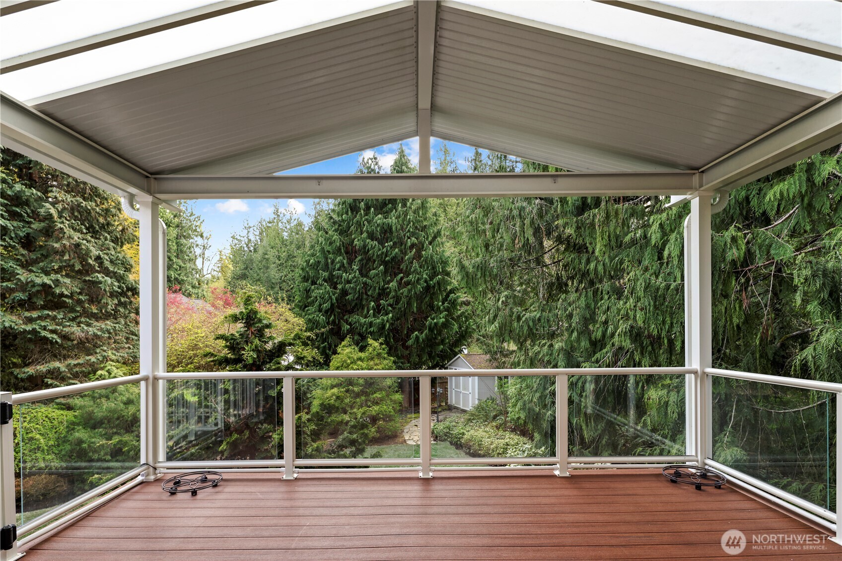 Right off the dining area is your additional covered outdoor dining space