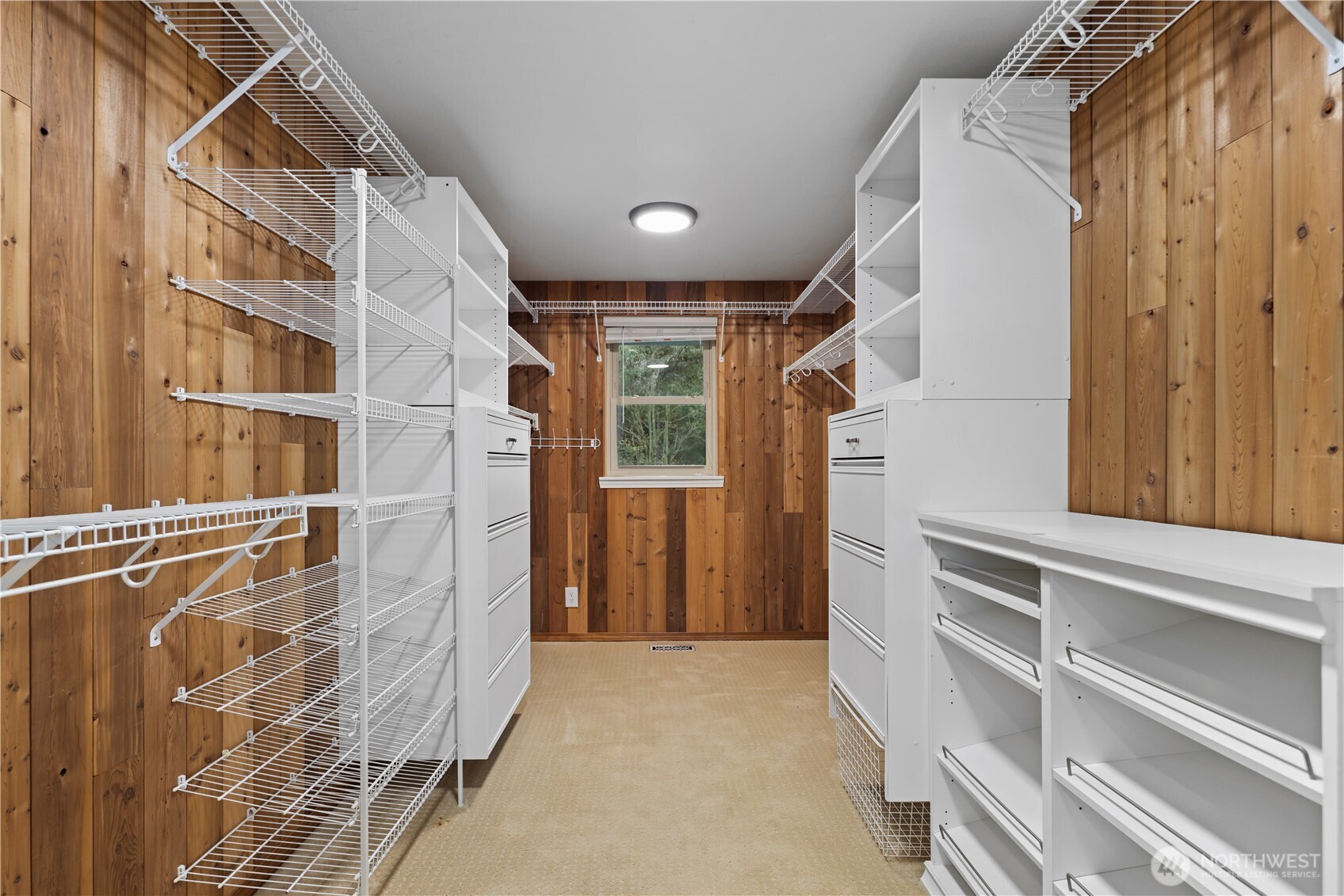 Generous walk-in closet with built-ins