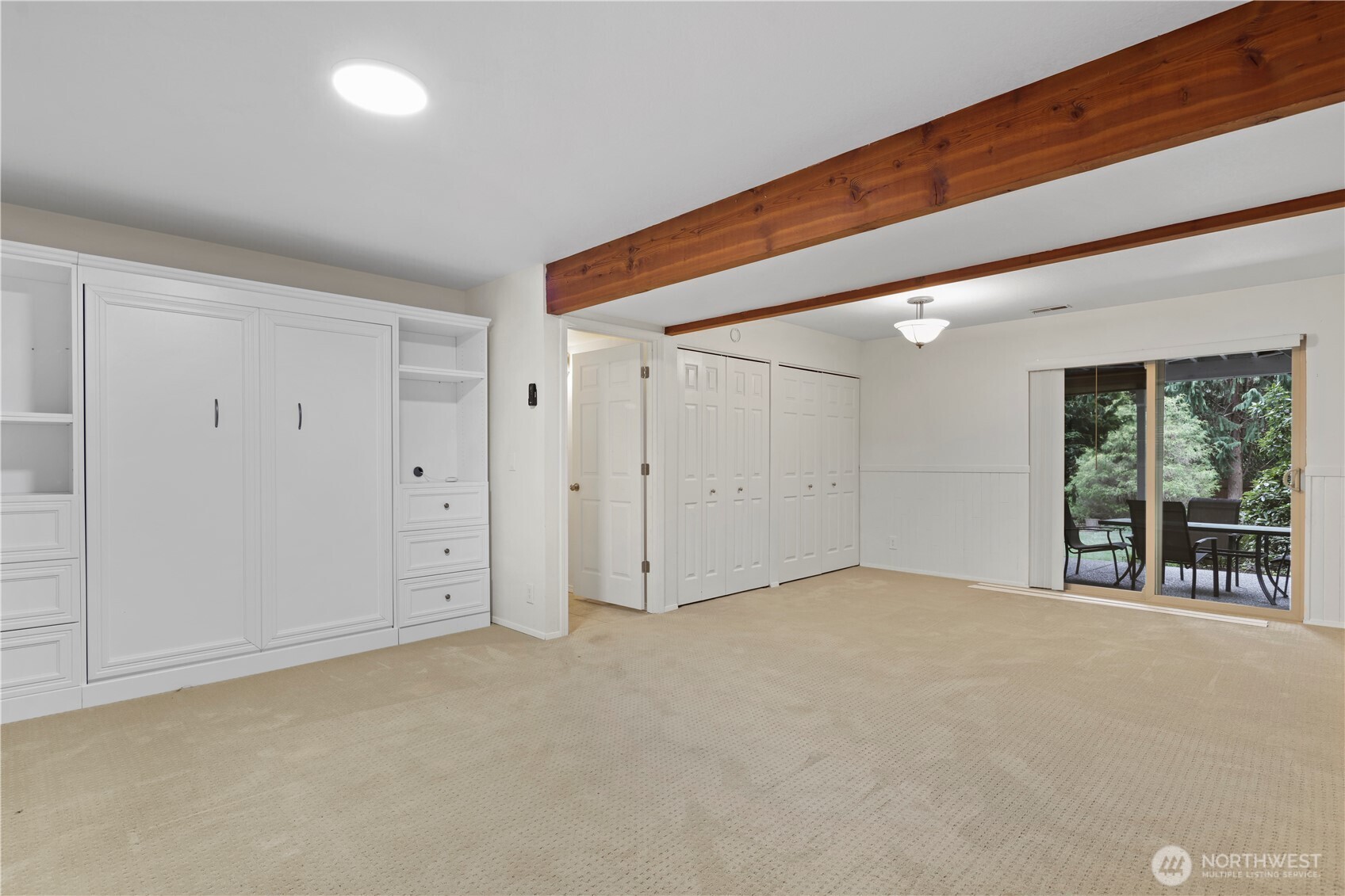 That's a double-sized Murphy bed on the rec-room wall