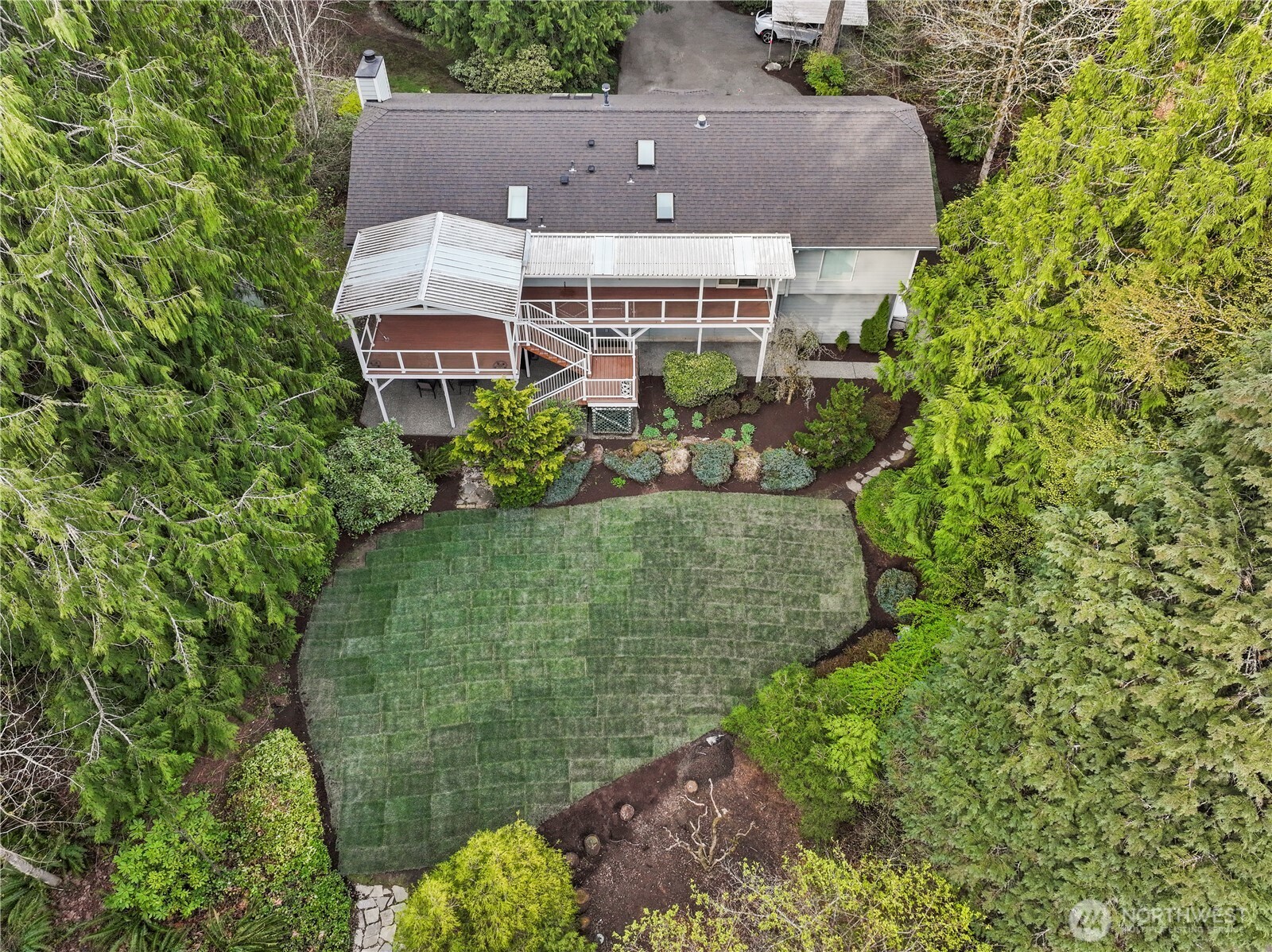 Towards the front of the property is a firepit & picnic area..