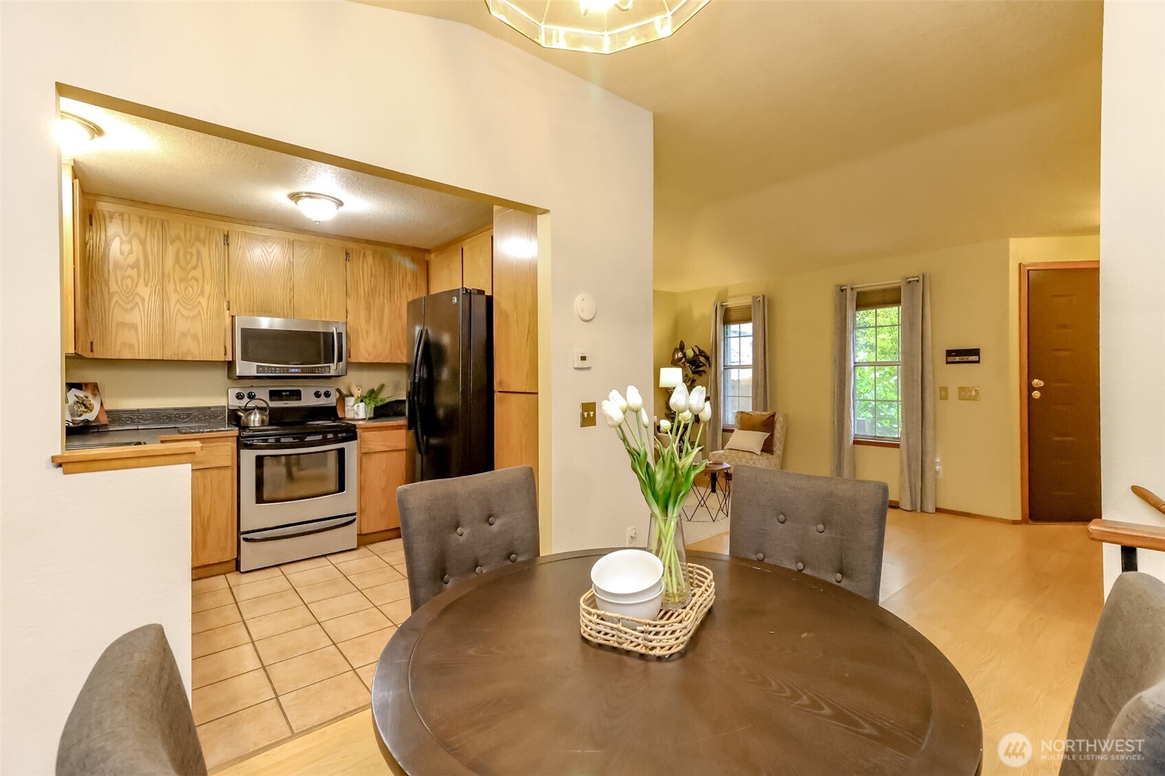 Dining room kitchen and living room all in frame