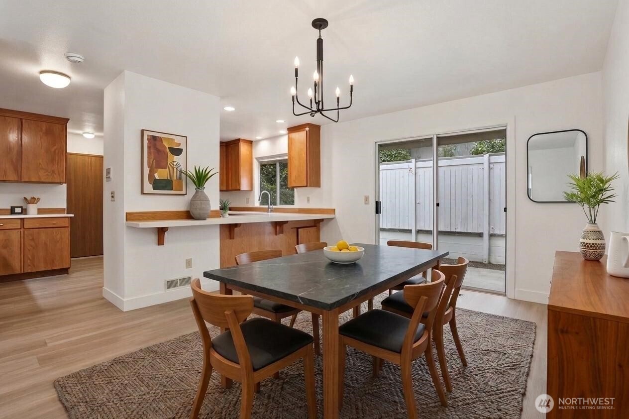 Virtually staged main floor dining room