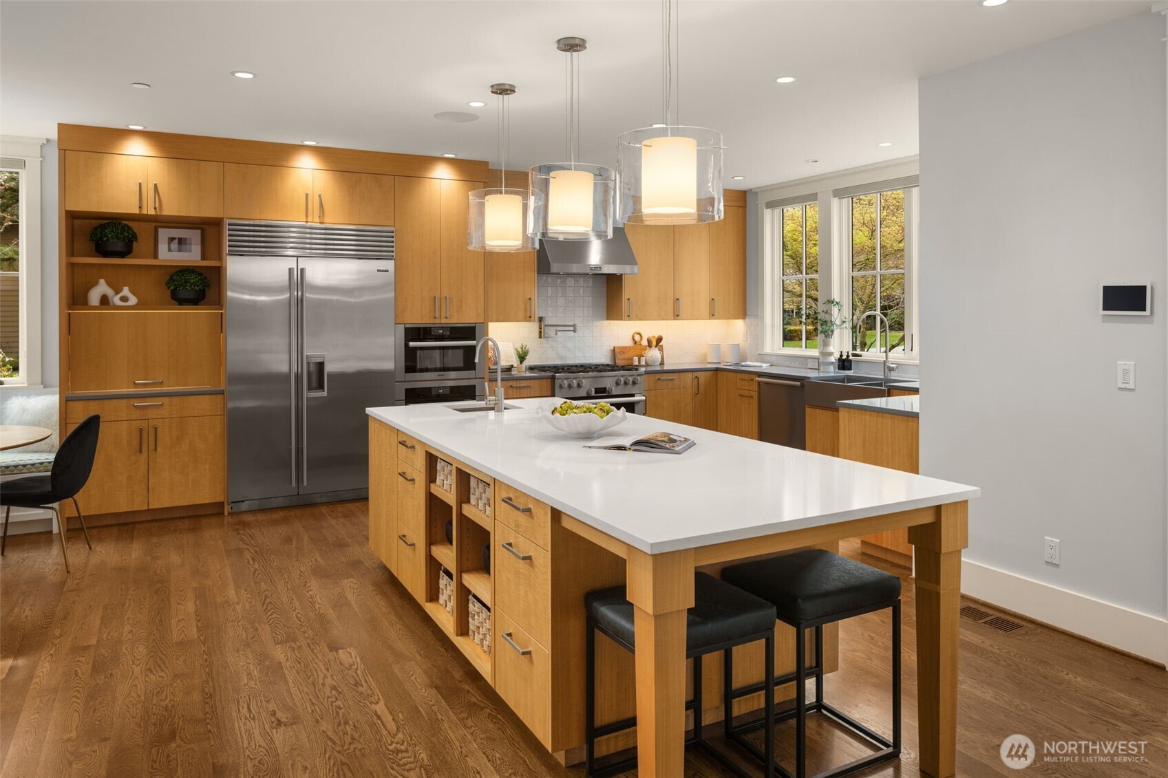 Culinary Showcase Kitchen with Custom crafted solid Anigre wood cabinetry.