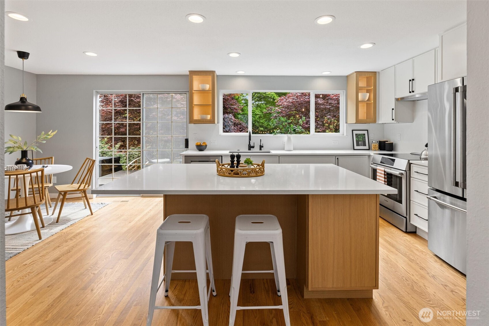 Sunlight pours through expansive windows.