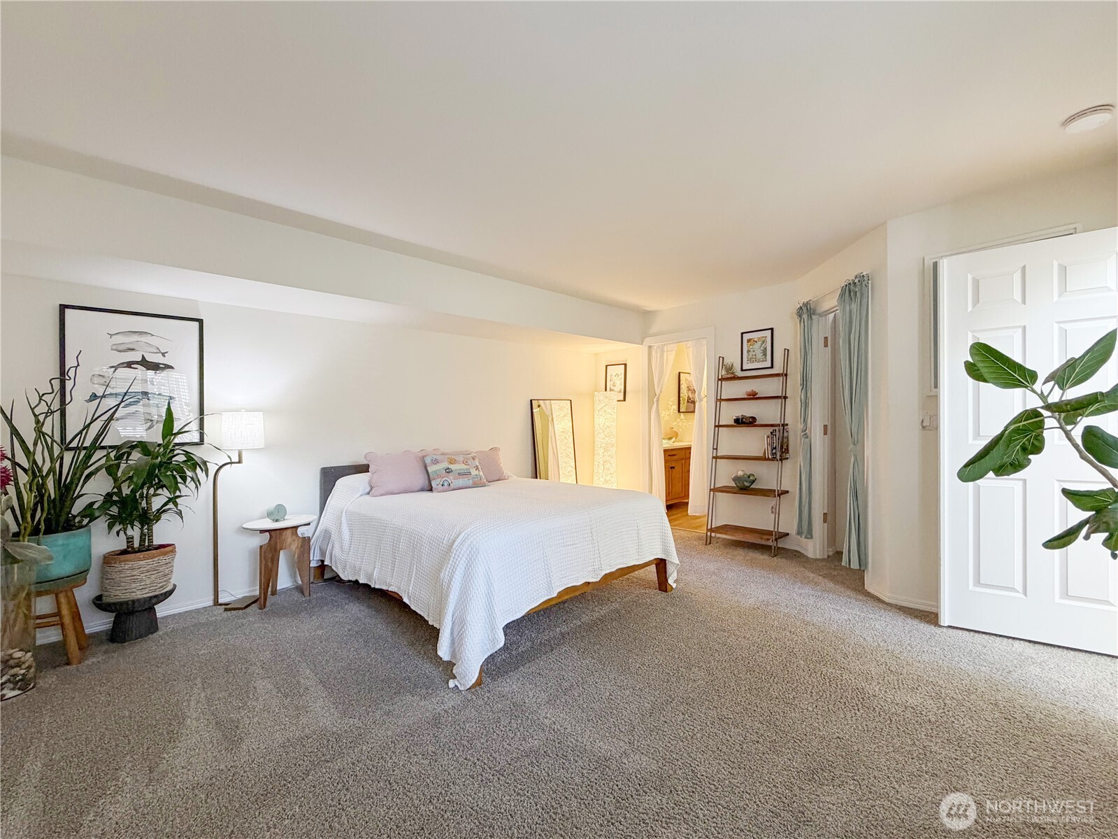 Spacious primary bedroom on the main level