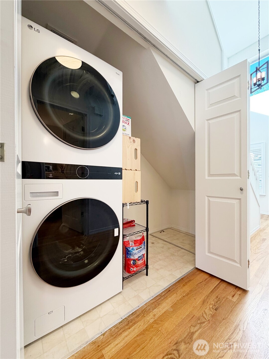 Main floor laundry with extra storage space