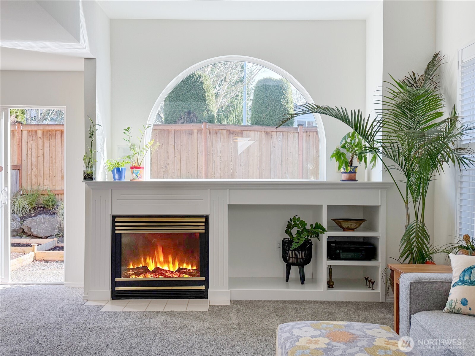 Cozy gas fireplace and lovely built-ins