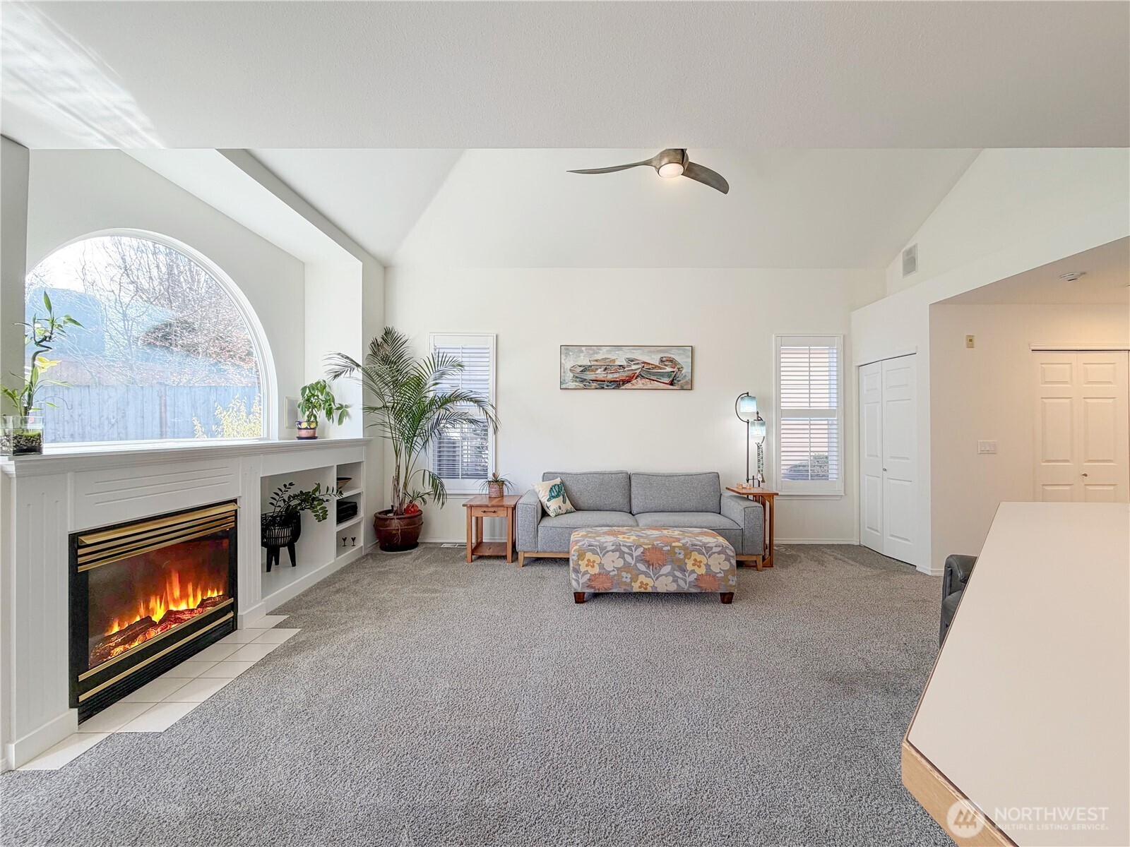 Living room as viewed from the dining/kitchen area