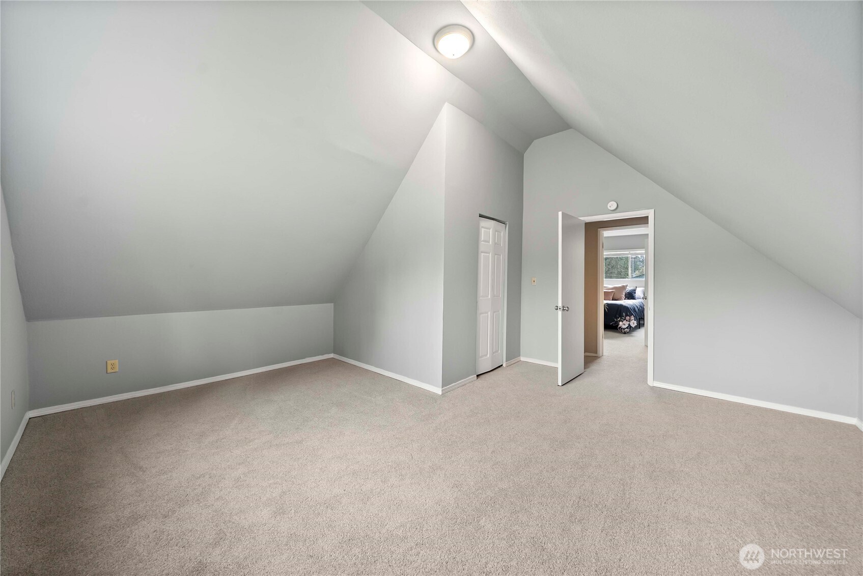 Bedroom with vaulted ceilings upstairs