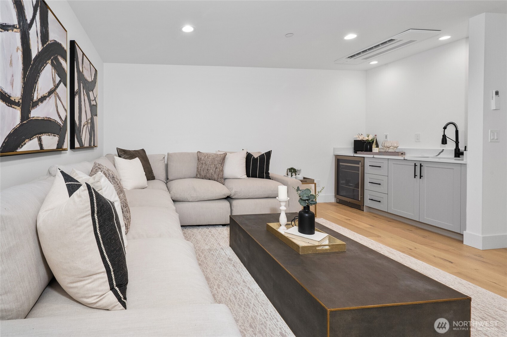 Media room with wet bar & beverage refridgerator downstairs