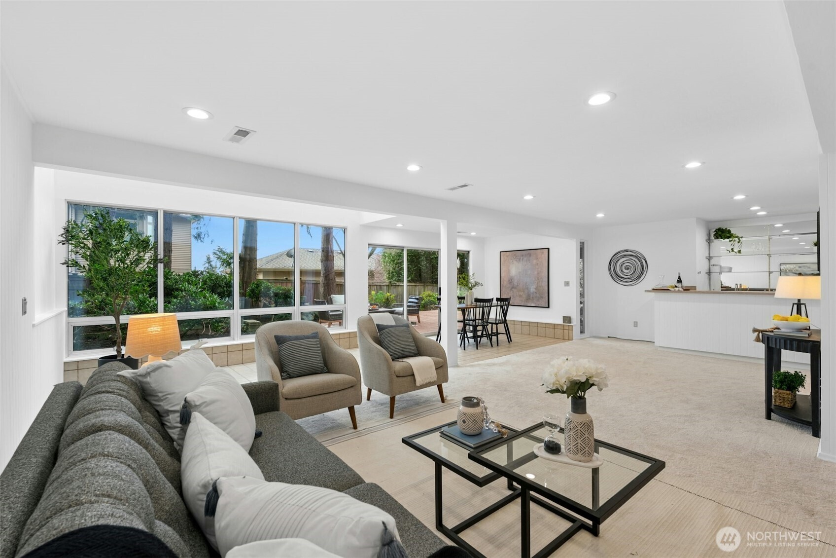 Spacious family room with gas fireplace & wet bar