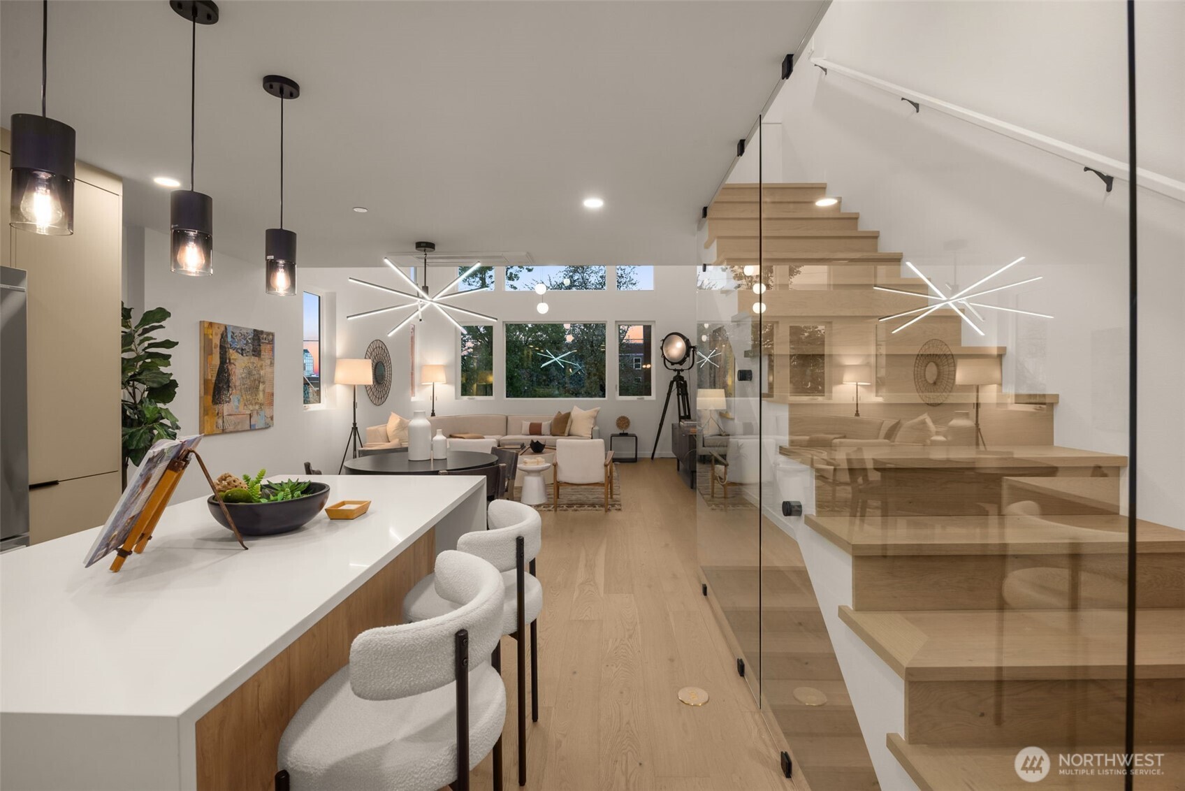 The massive kitchen island features a 3cm waterfall slab with an abundance of eating space