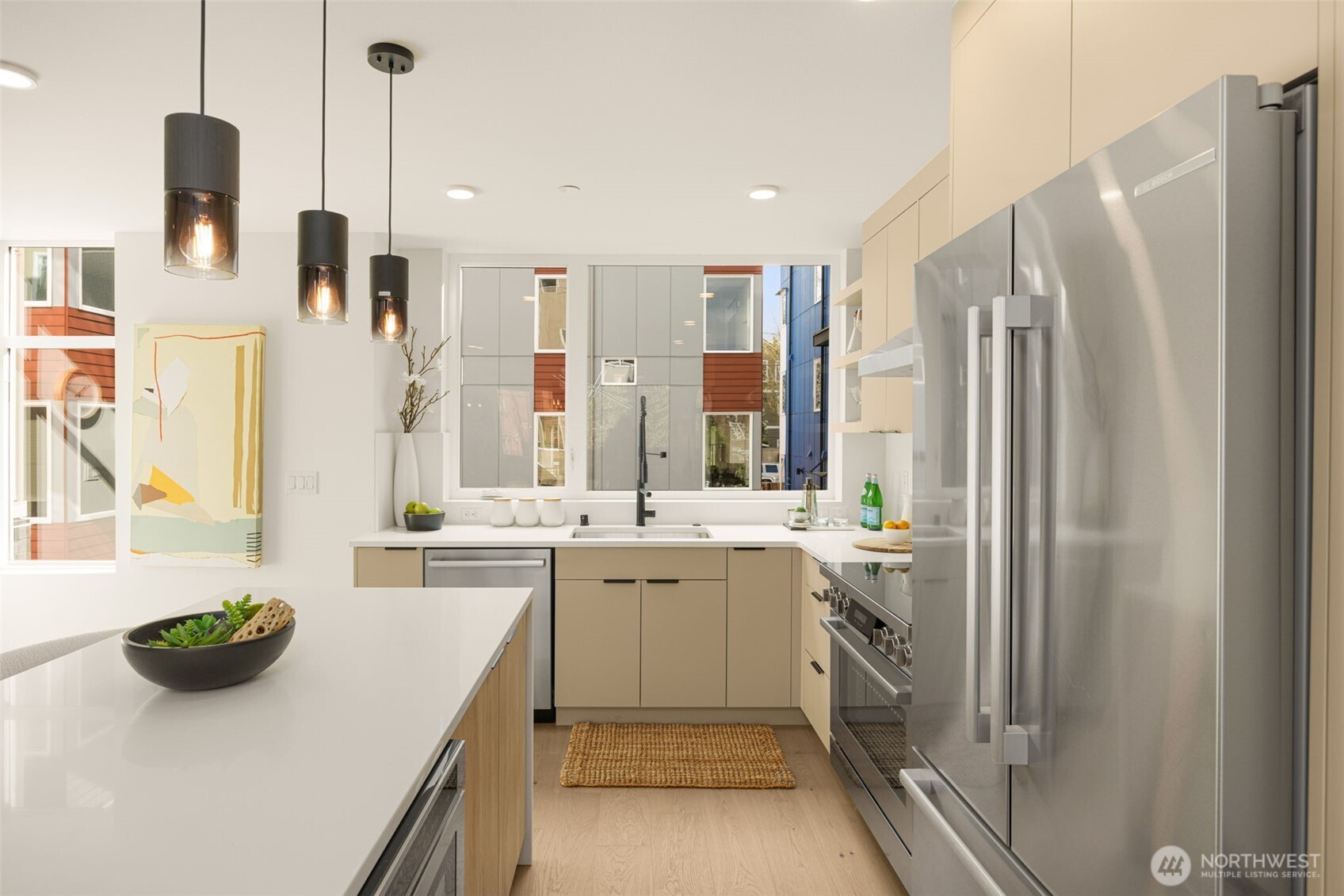 Premium stainless steel suite highlighted by a professional-grade 6-burner gas stove.