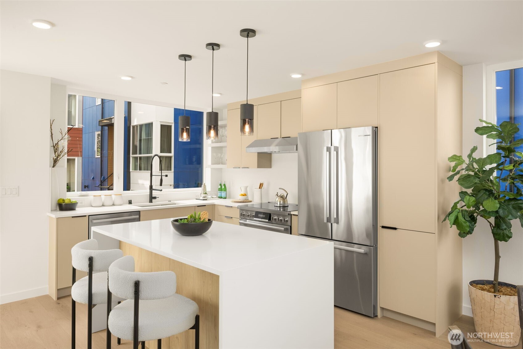 Sleek cabinetry and high-end materials create a masterclass in culinary design.