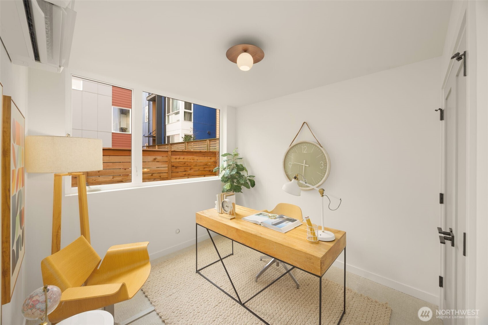 The ground level offers a bed & bath- making for a perfect guest suite or home office!