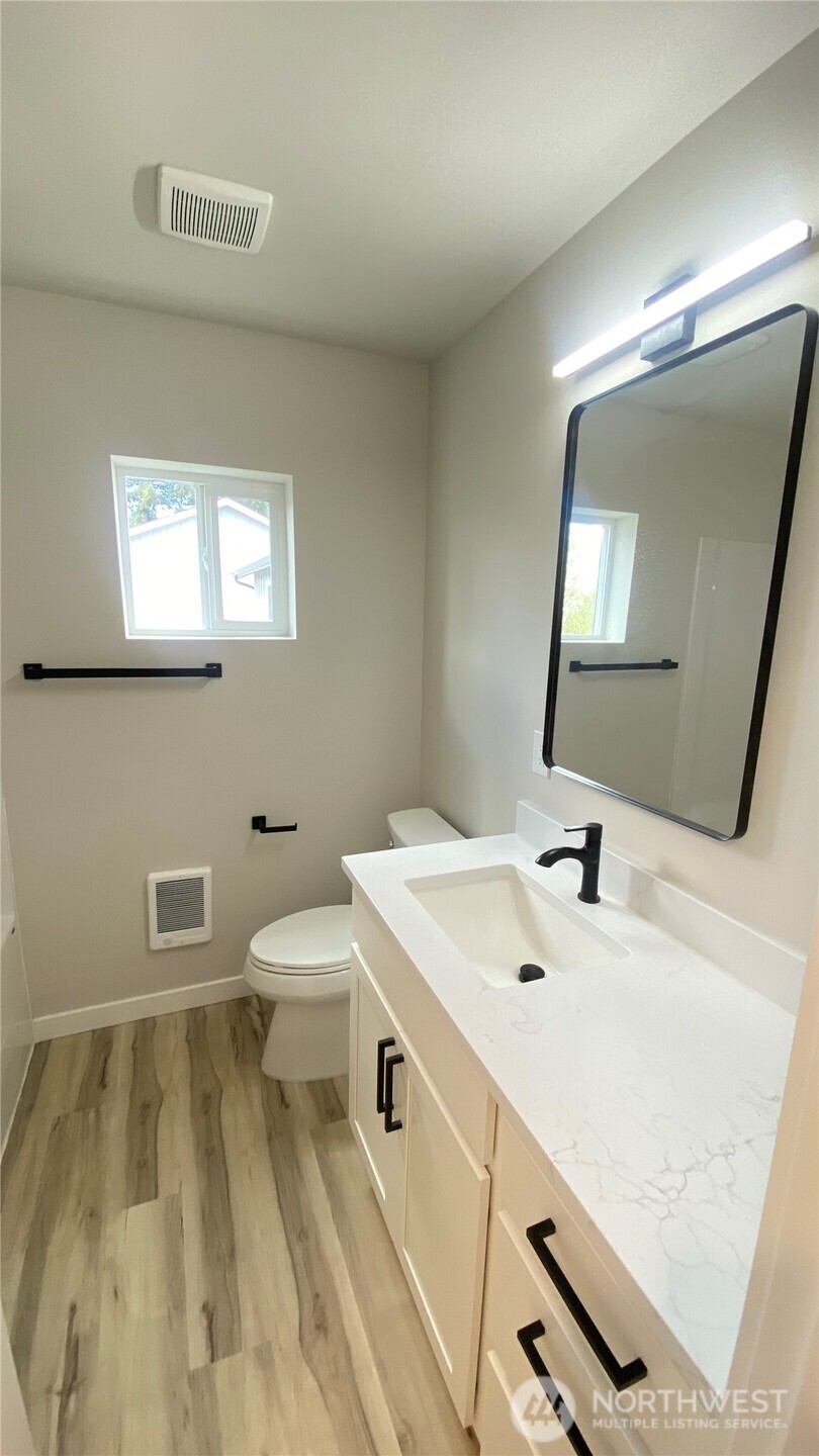 1 of 3 bathrooms