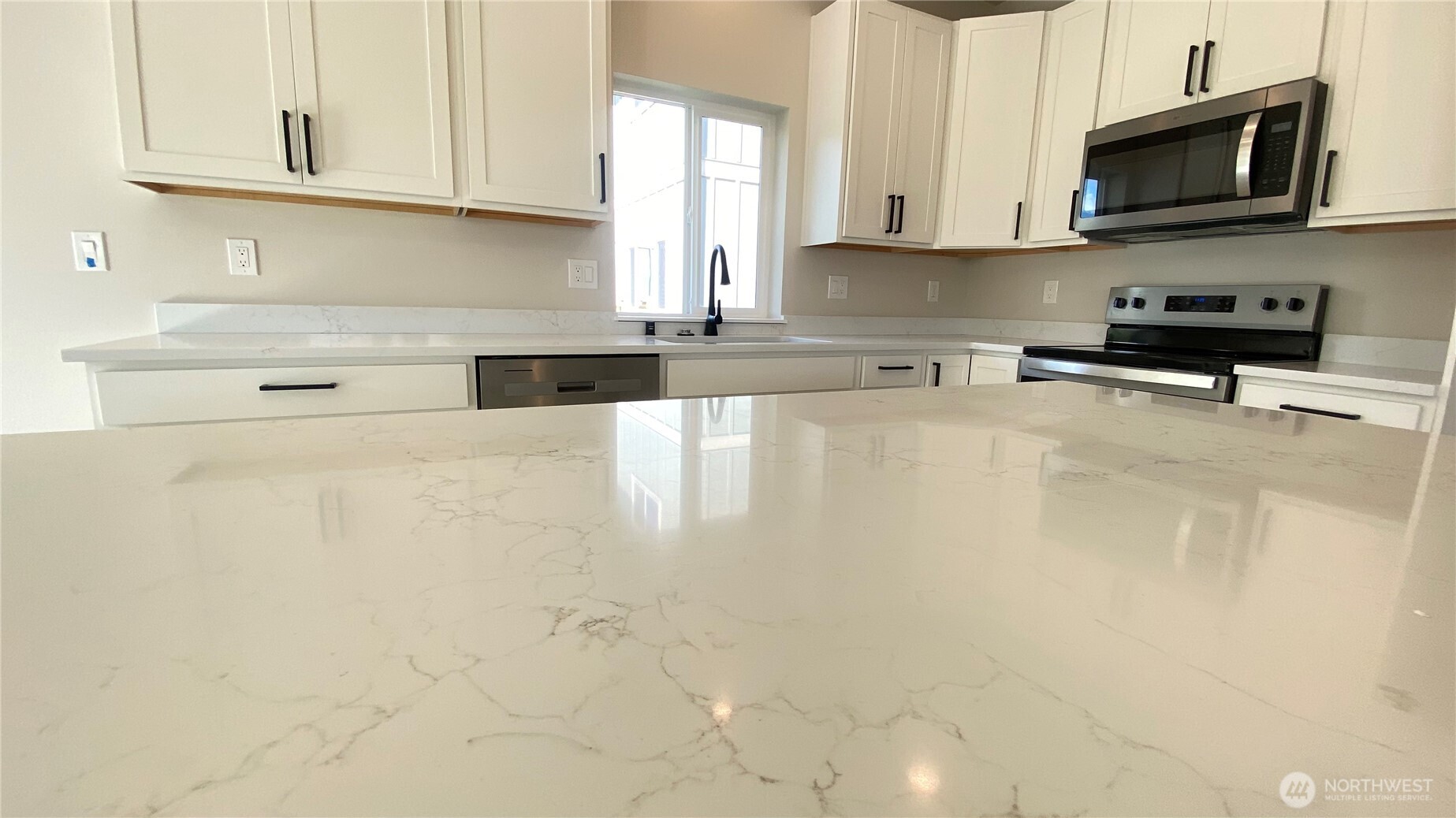 Primary bath. Behind the door is another stand in shower. pic virtually staged