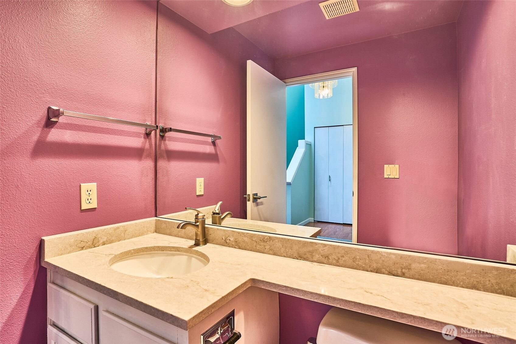 This is the main floor half-bath, powder room.