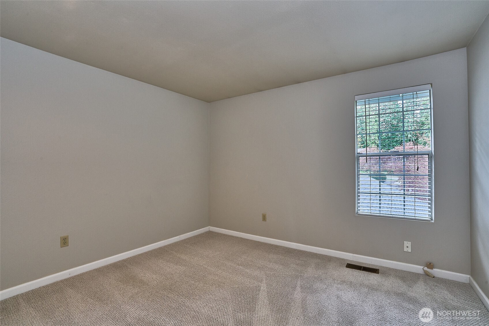 This shows the second bedroom located upstairs as well.