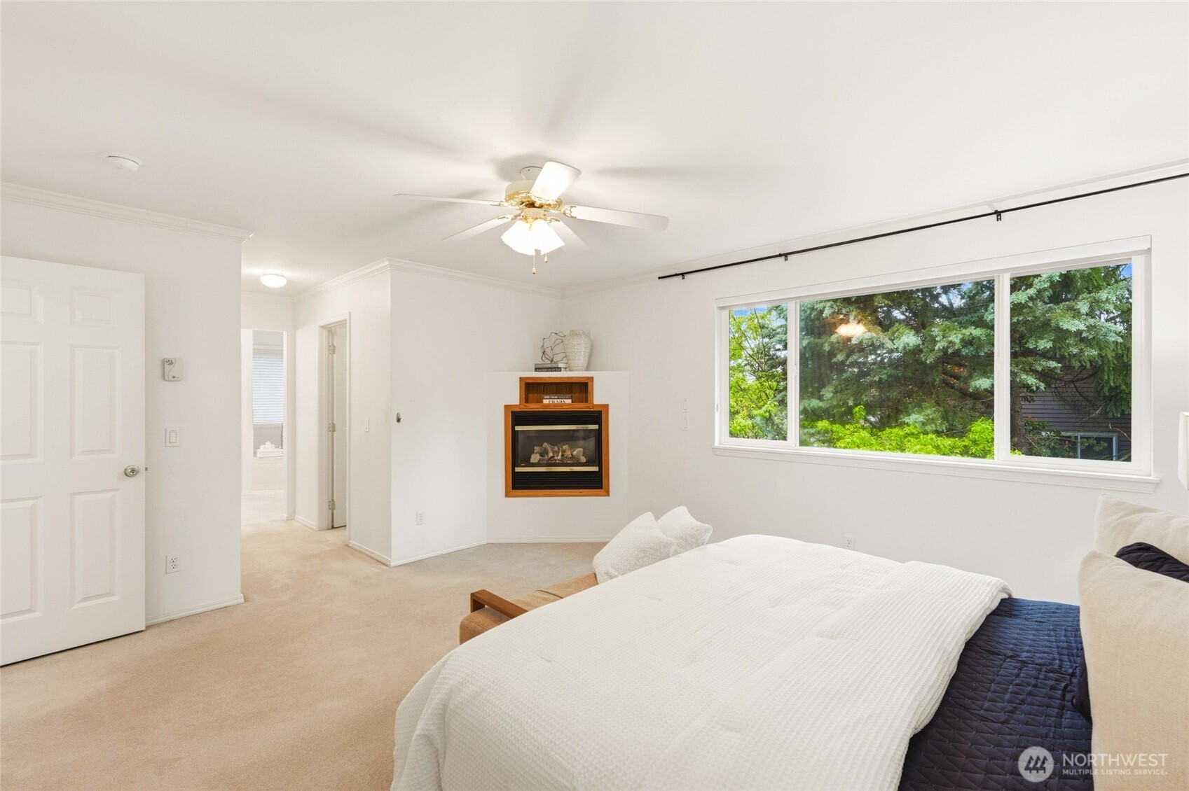 primary suite with large windows