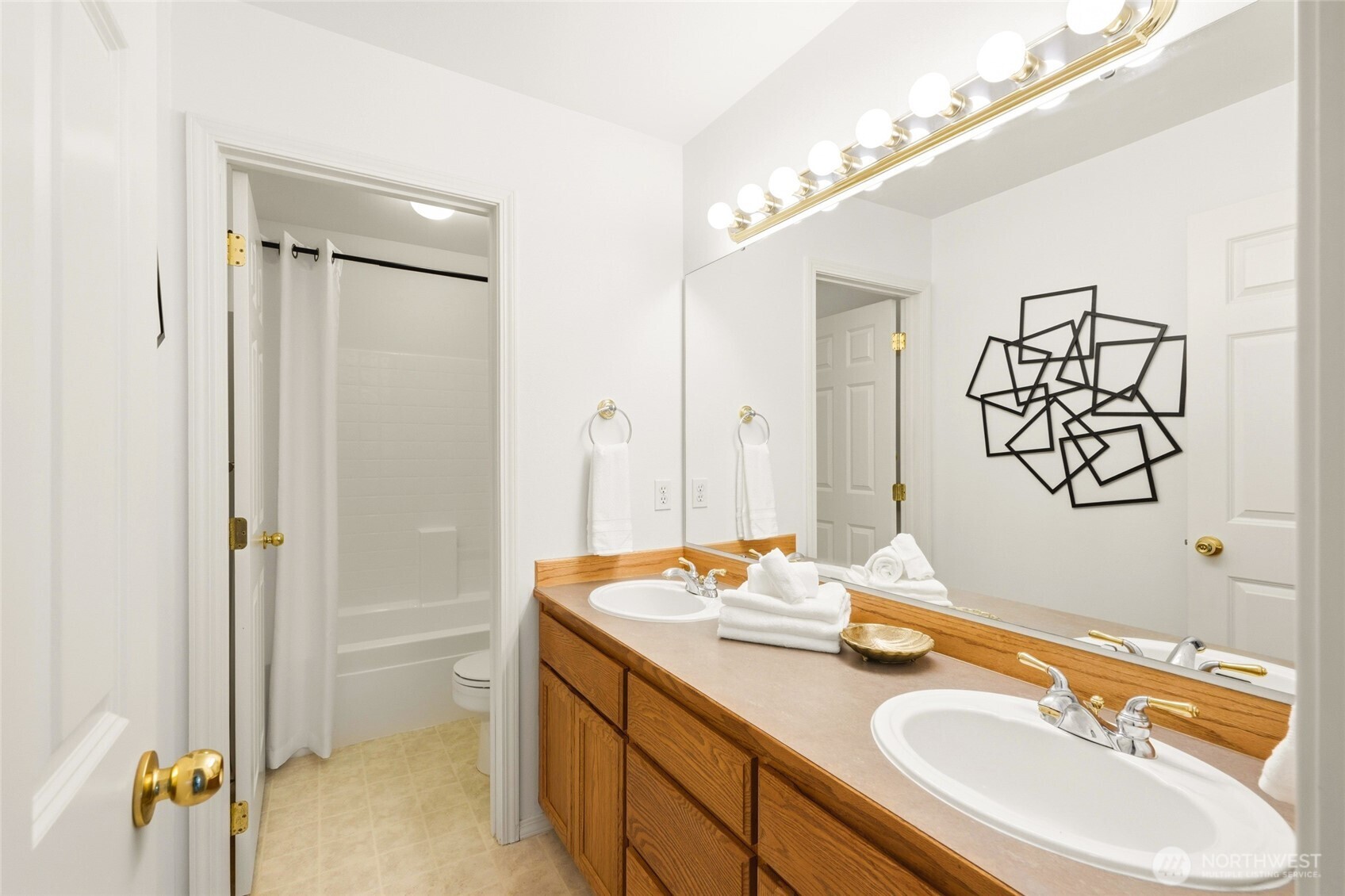 main bathroom with dual sinks