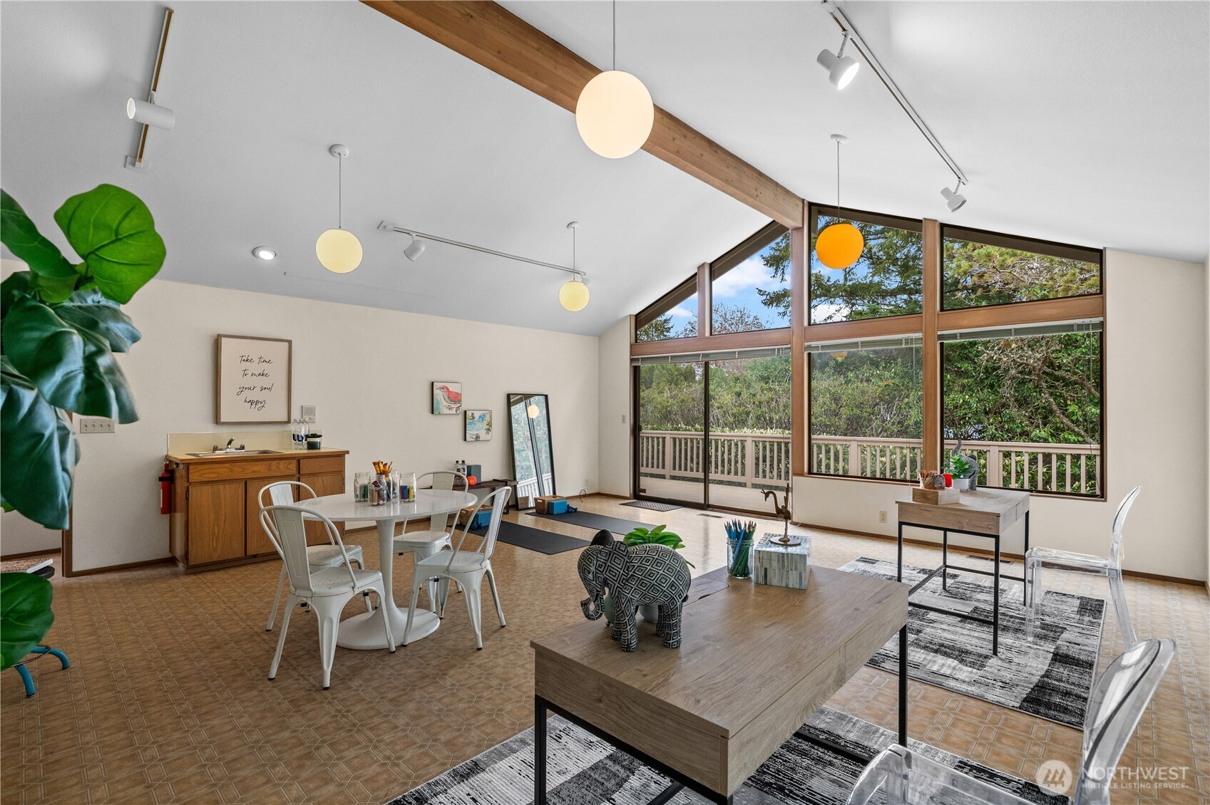 Floor to ceiling windows offer another gorgeous view of the surrounding gardens - an artistic inspiration!