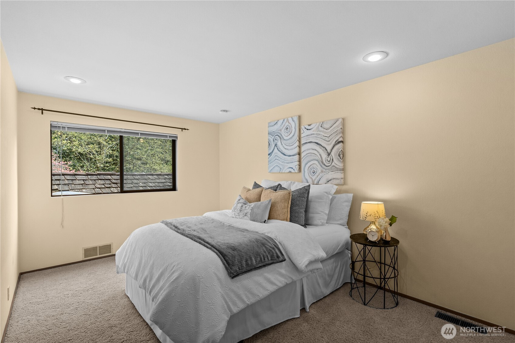 Bedroom 3. Another spacious room with views of the surrounding landscpae.