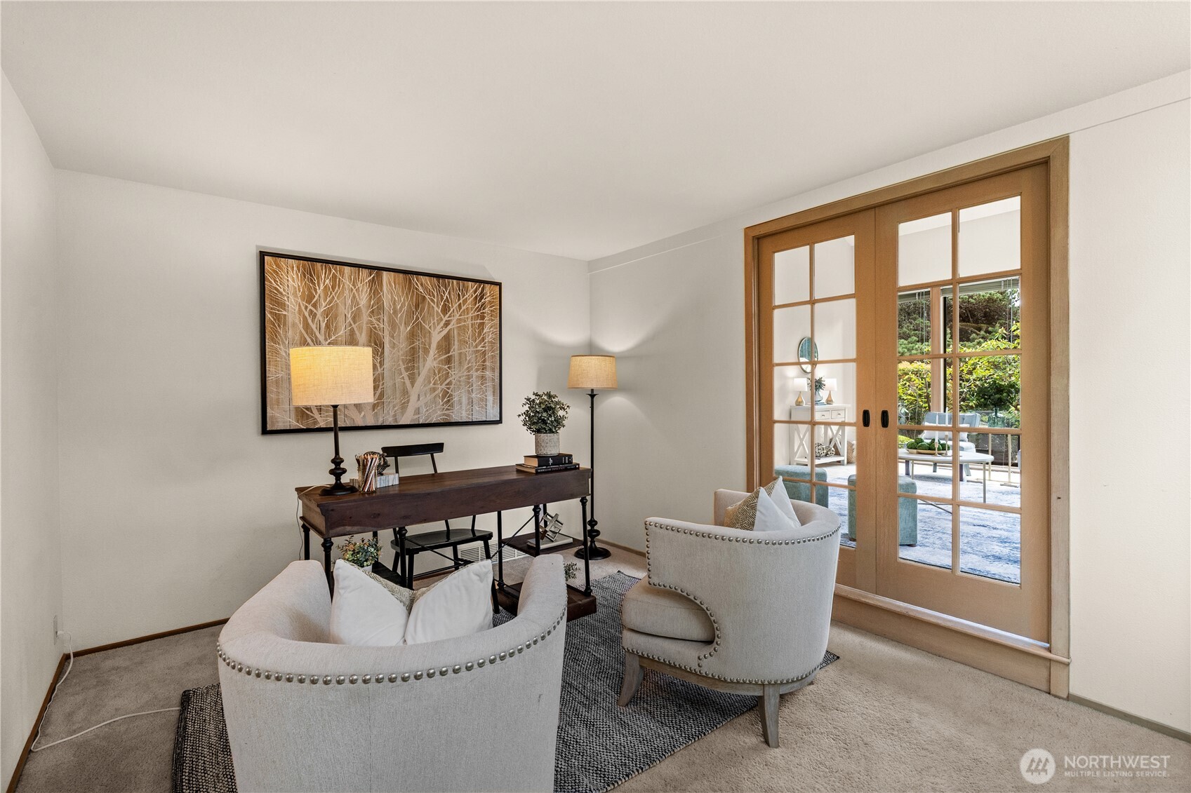 Is it a den?  home office? ...or can it be reimagined as a lounge area complete with a wet bar?