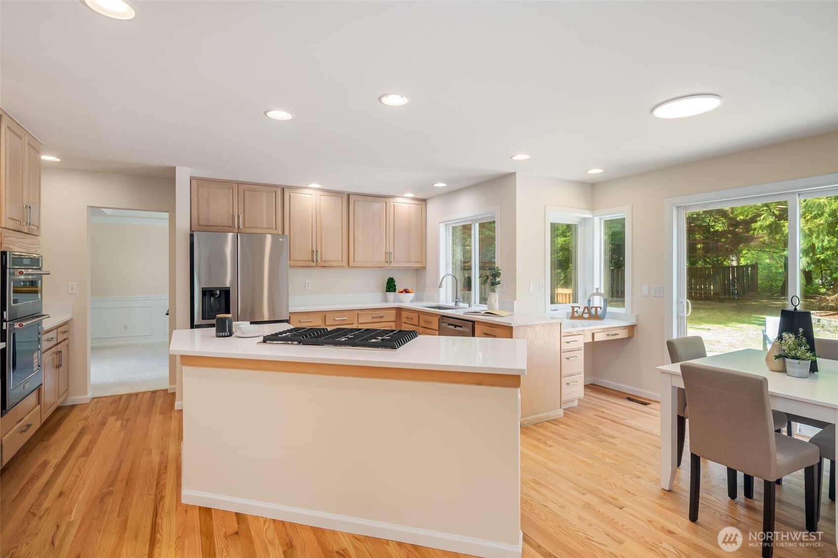 Kitchen features slider to the truly entertainment sized deck and patio.