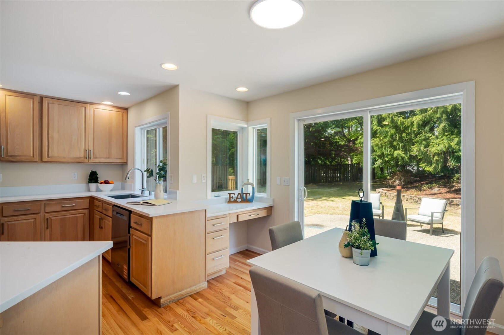 Family room off the kitchen with great view of the deck and backyard.