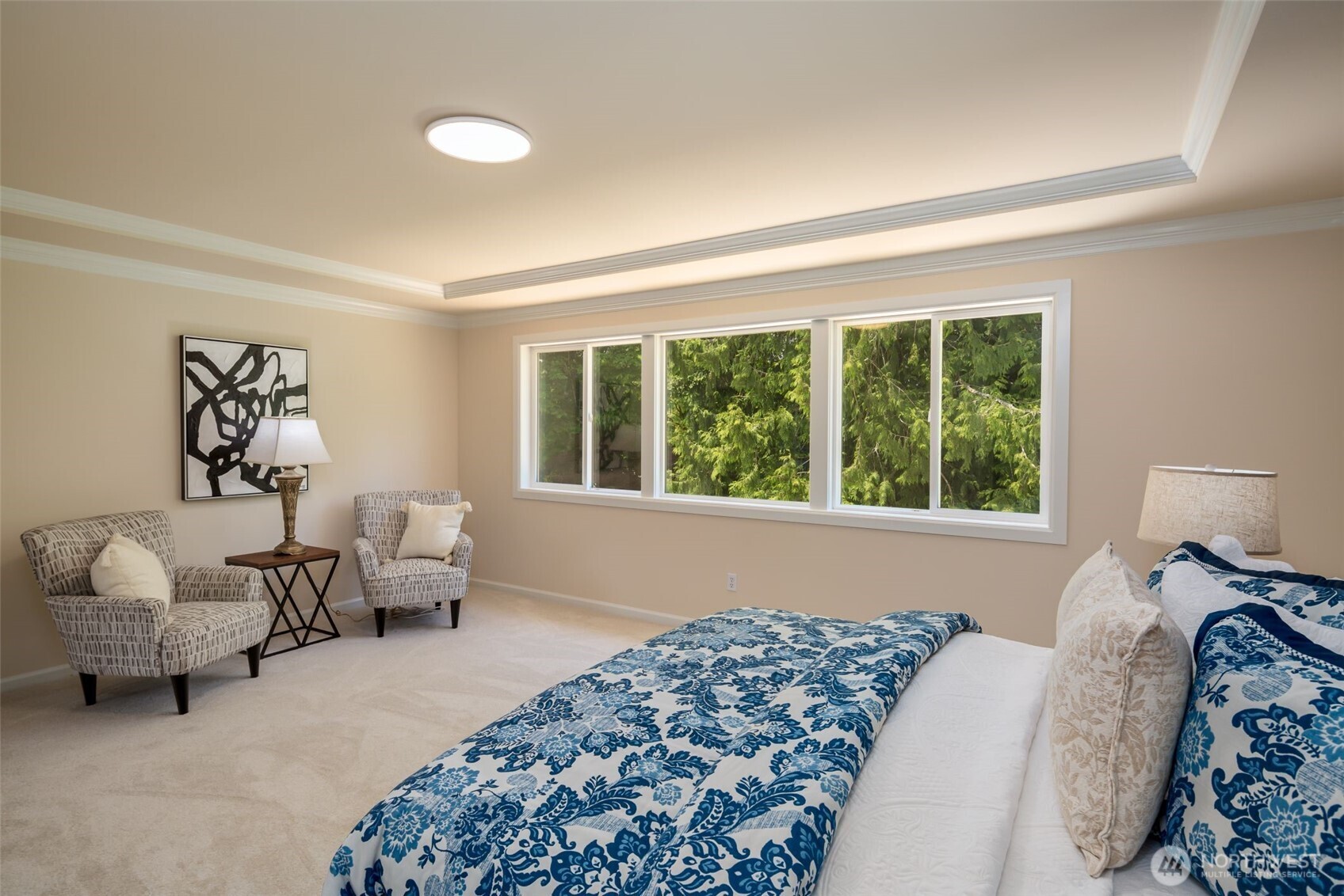 Another view of the primary bedroom.