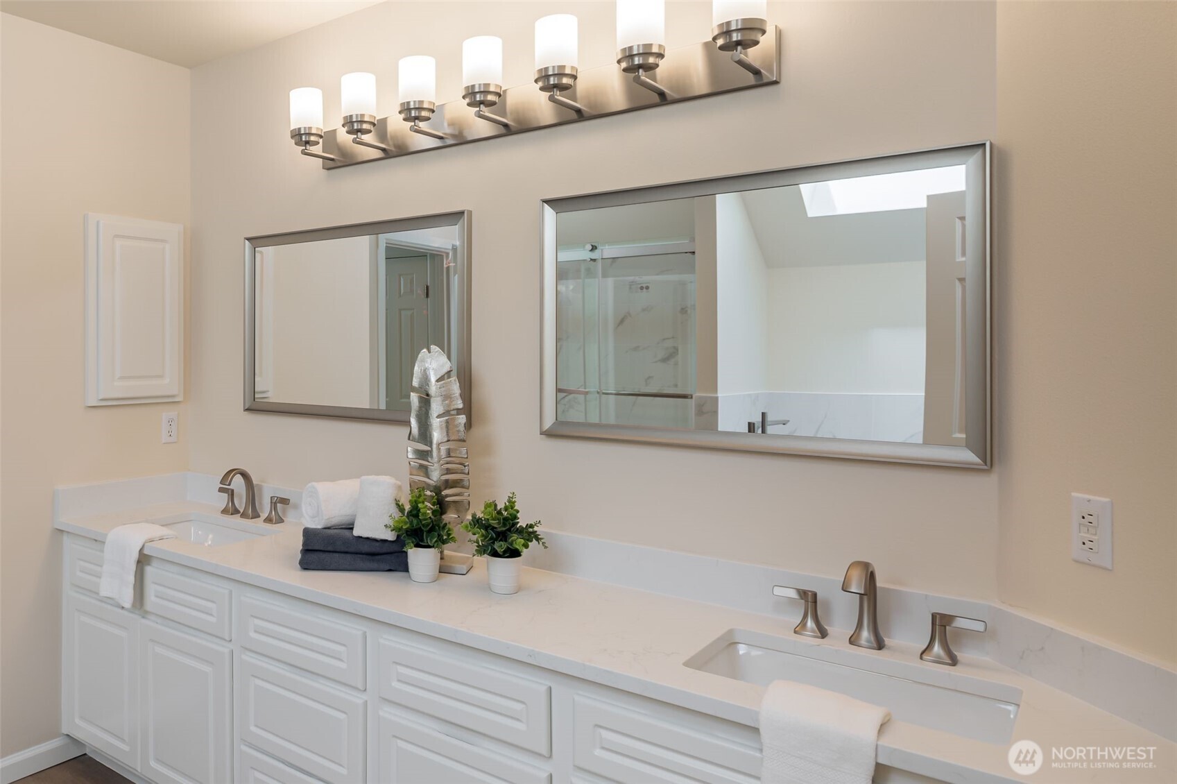 View of the soaking tub and newly remodeled shower.   The toilet room is conveniently separate from the main part of the bathroom.