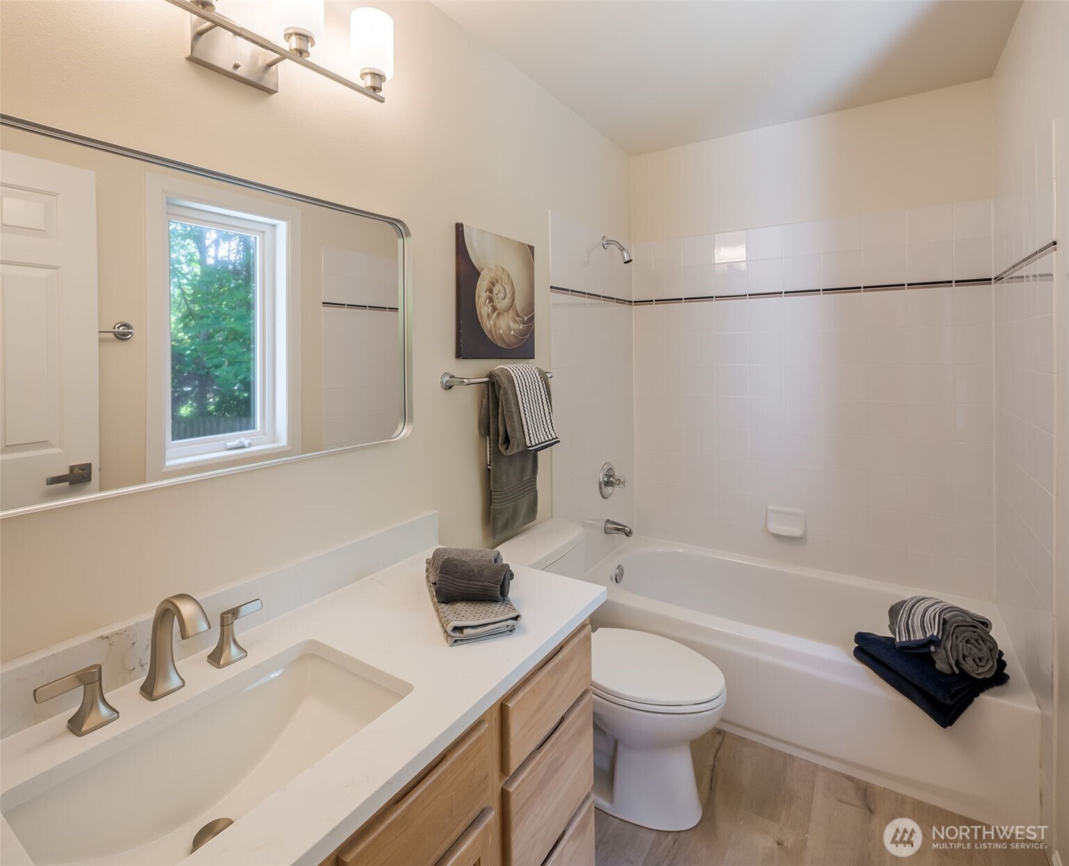 Updated Bathroom off the Jr. primary suite.