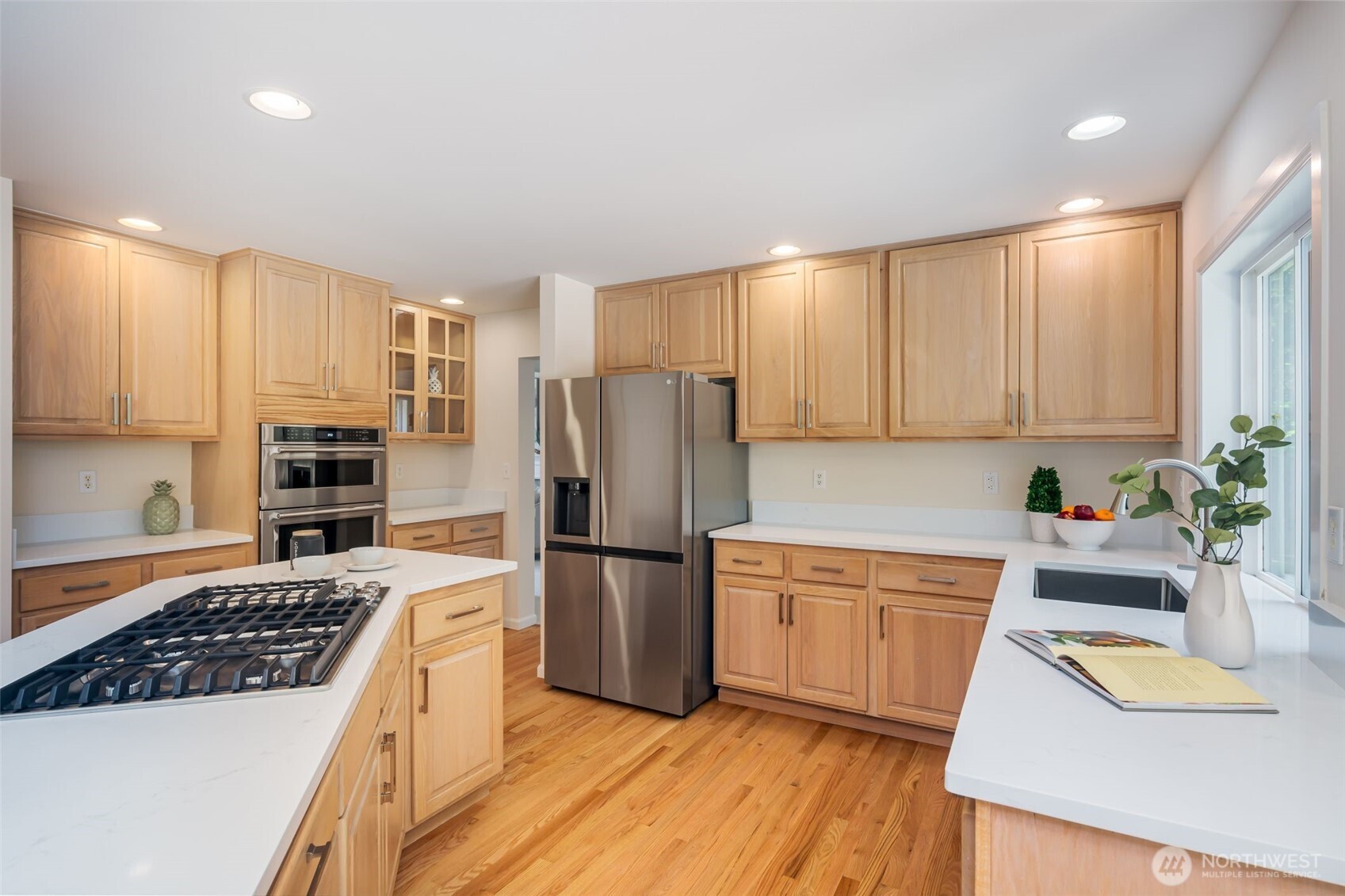View from the kitchen to the eating space and family room...you're always part of the action!