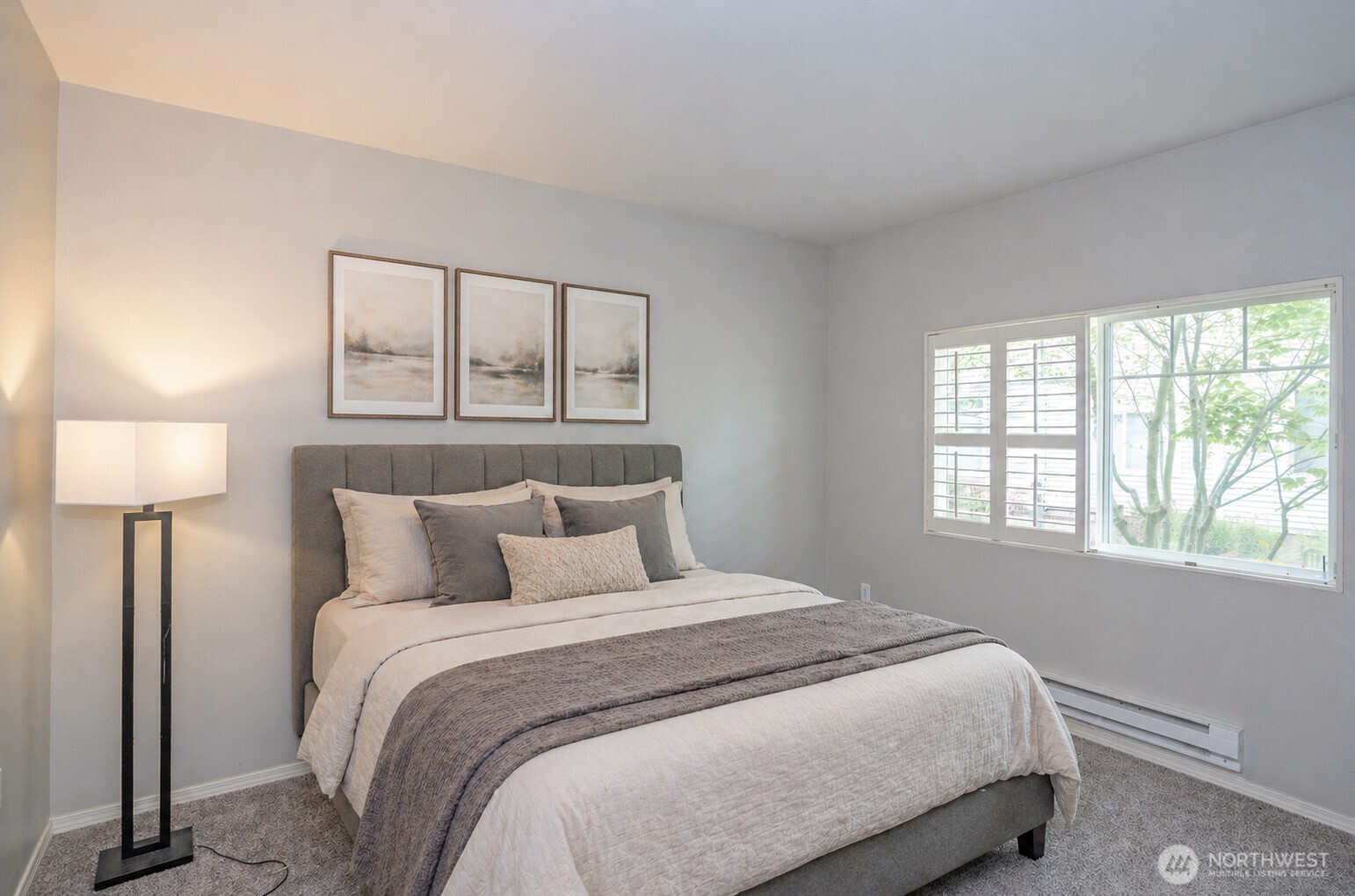 Bright and inviting primary suite offering a comfortable and relaxing retreat.