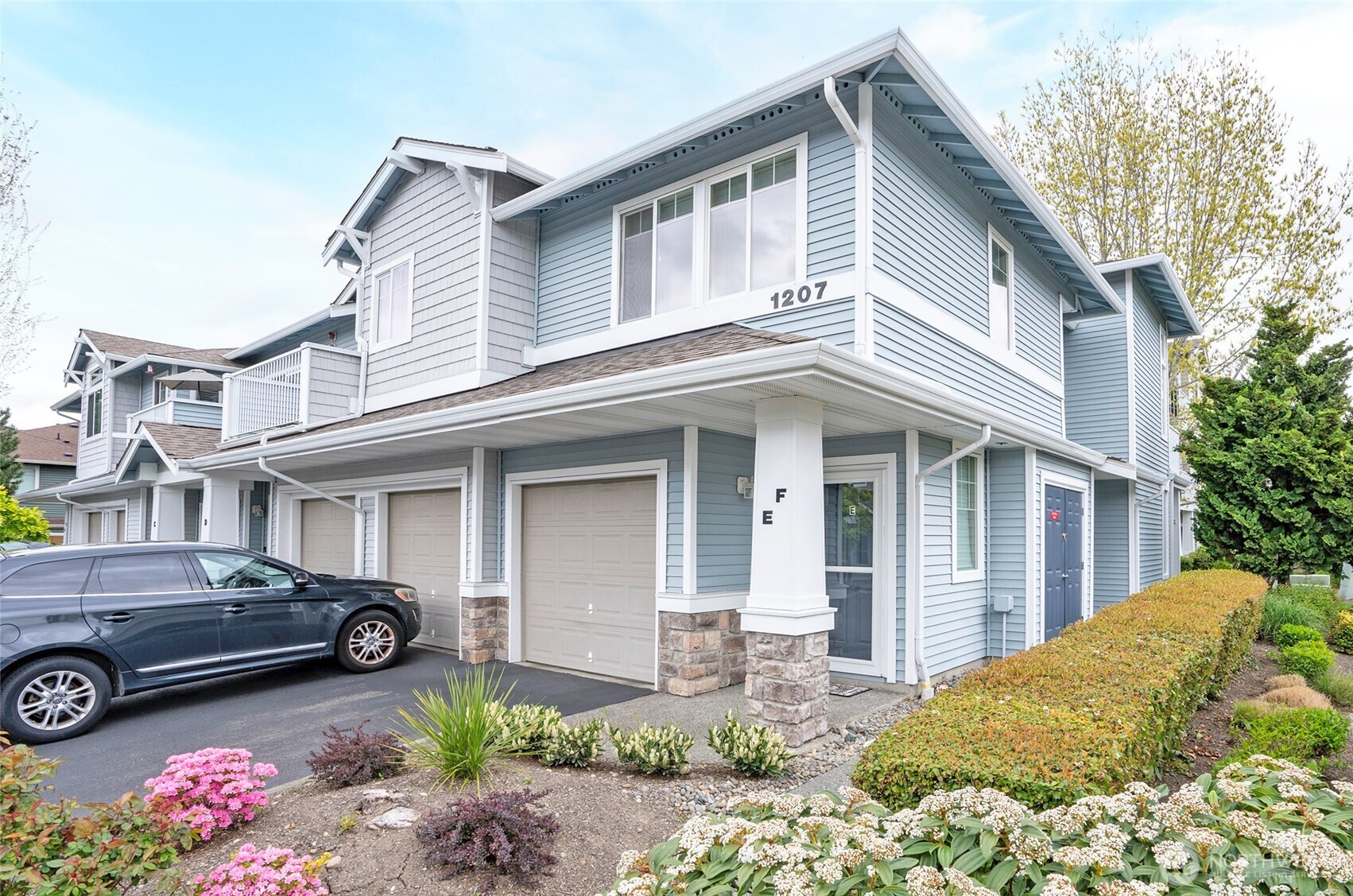 Beautifully manicured grounds create a welcoming and inviting setting.