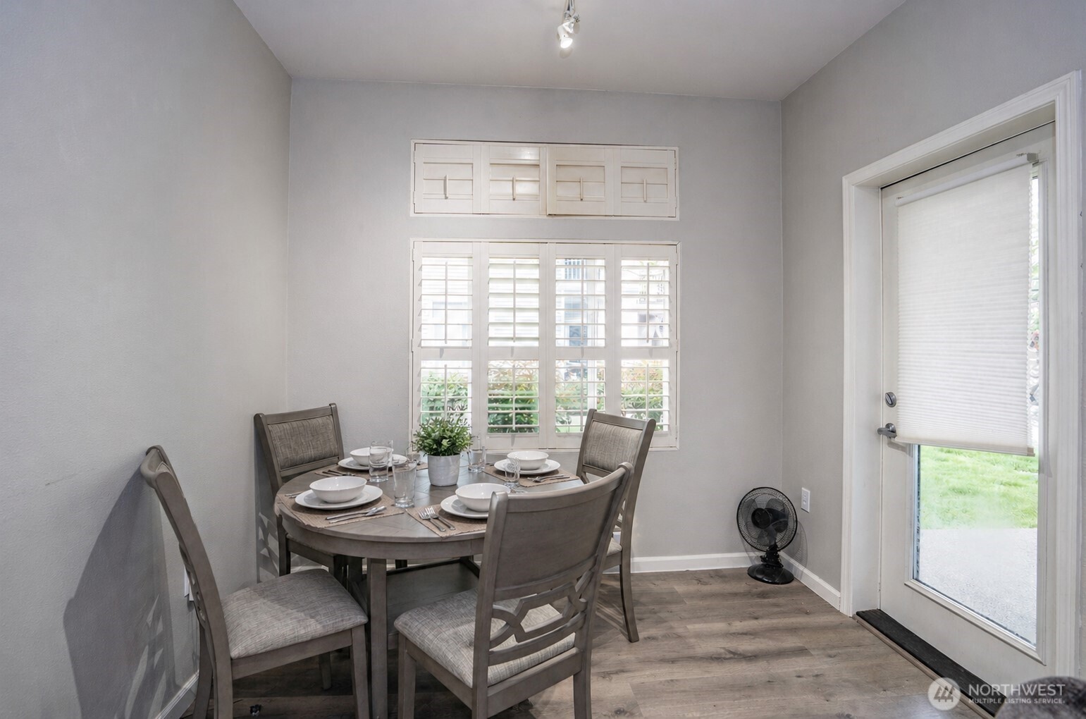 Comfortable dining area with a convenient door that opens to the covered patio.