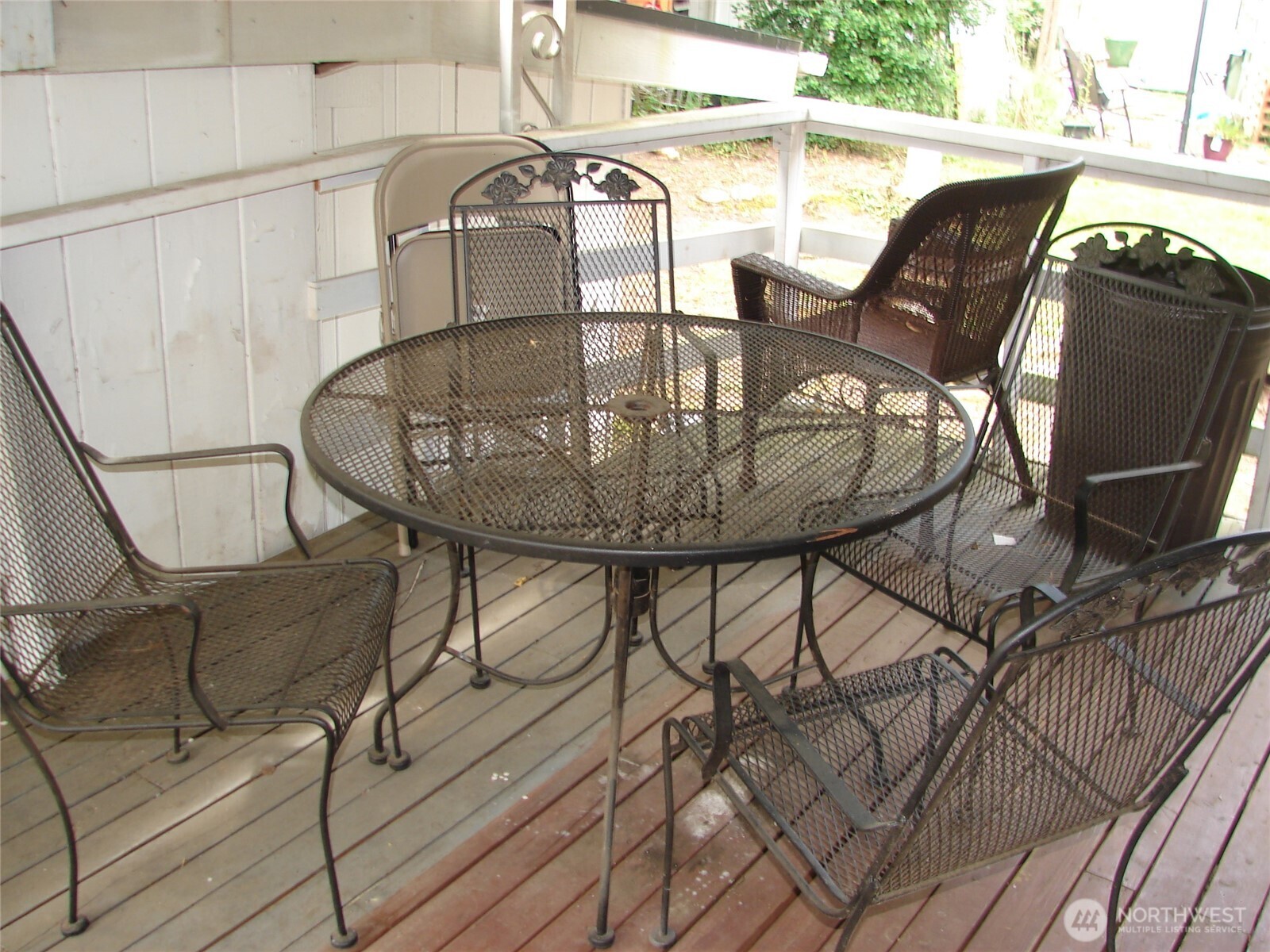 Relax in any weather on the covered front porch.