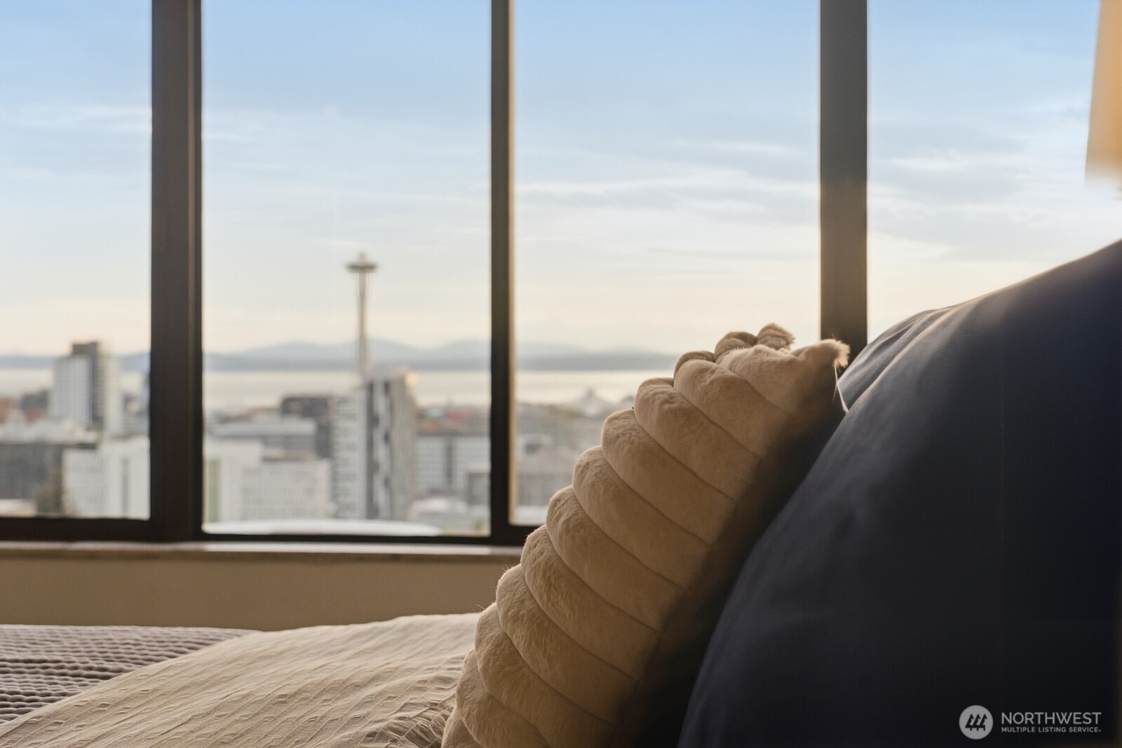 Wake to soft morning light and fall asleep to twinkling lights over the city - your urban retreat awaits.
