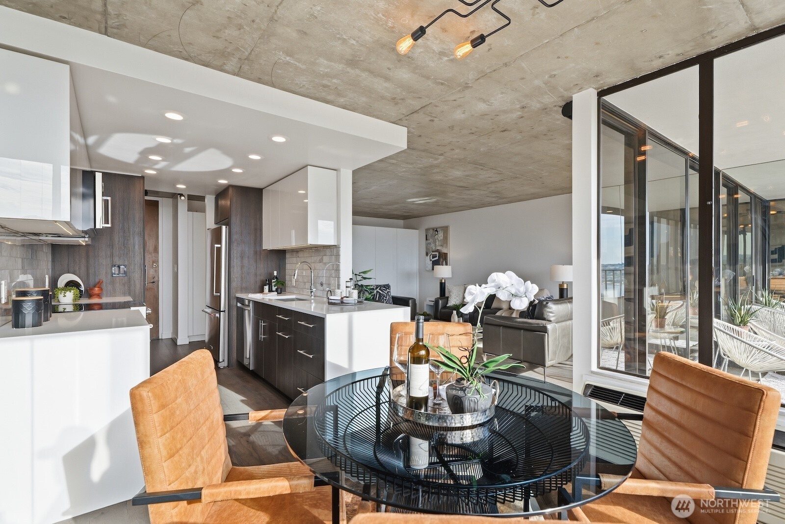 Hosting in this space is truly a dream - vibes flow effortlessly from living to dining to the kitchen.