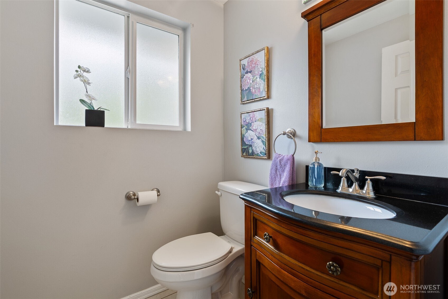 Half-bath between the dining room and the game room