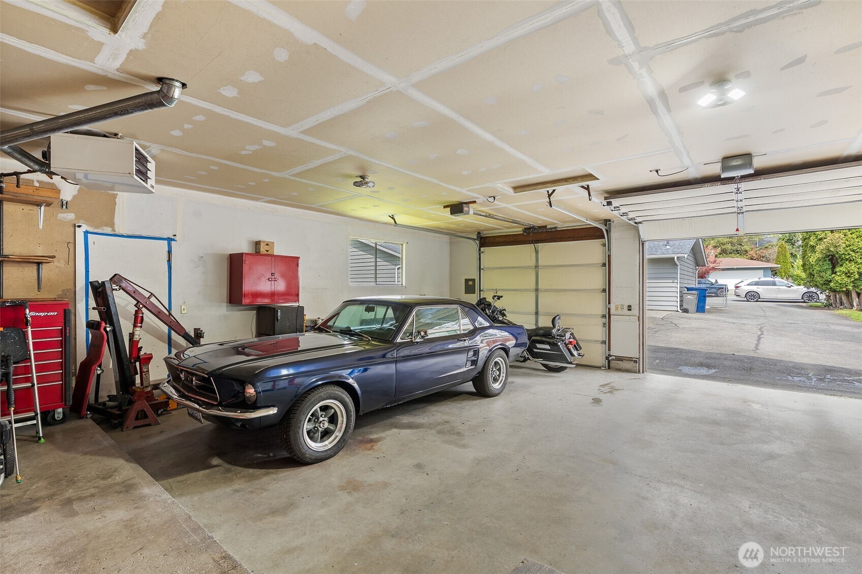 Garage/Shop is plumbed for air tools, 60 Gal air compressor is included