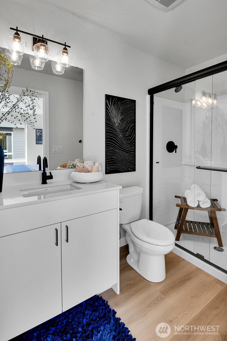 Stylish and bright Primary Bath with a large walk-in shower!