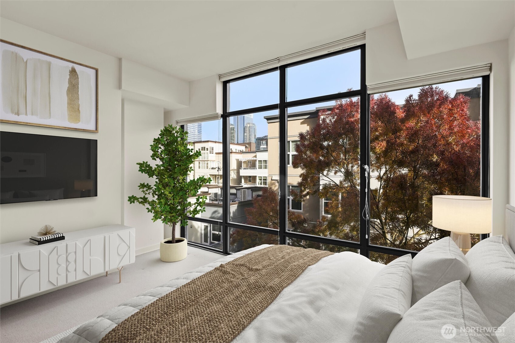 Tons of natural light accompanied with window coverings.