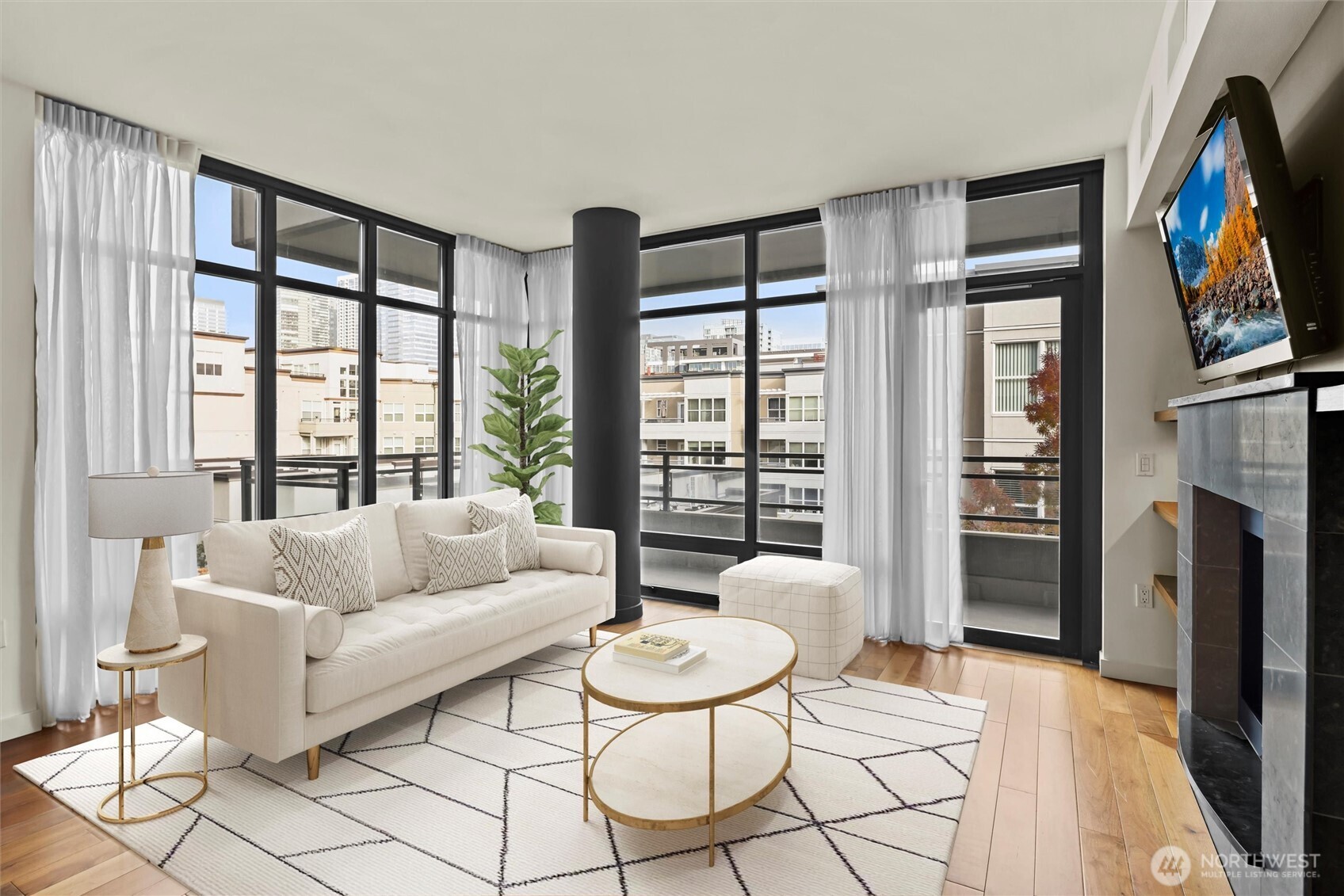 Sophisticated and casually chic! A statement fireplace anchors the room, thoughtfully centered to create a warm gathering space, and elegantly flanked by custom-built shelving.