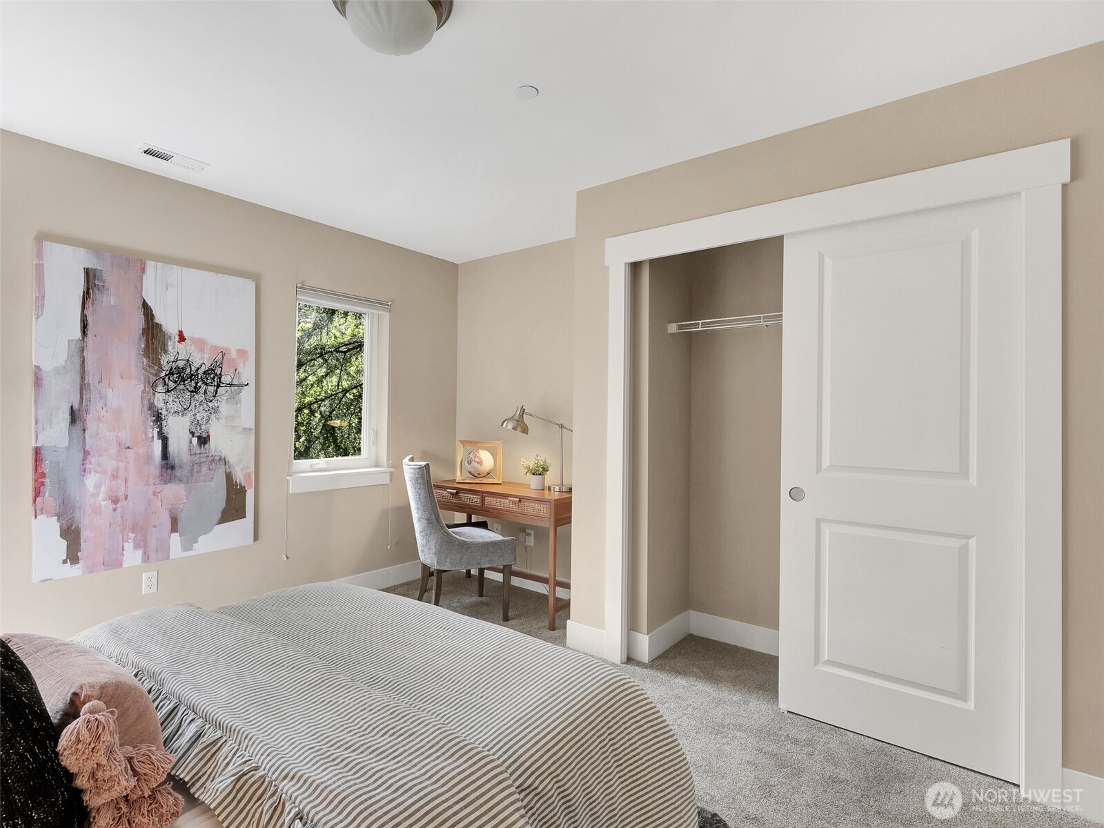 Generously sized bedroom with flexibility for guests, office space, or everyday living