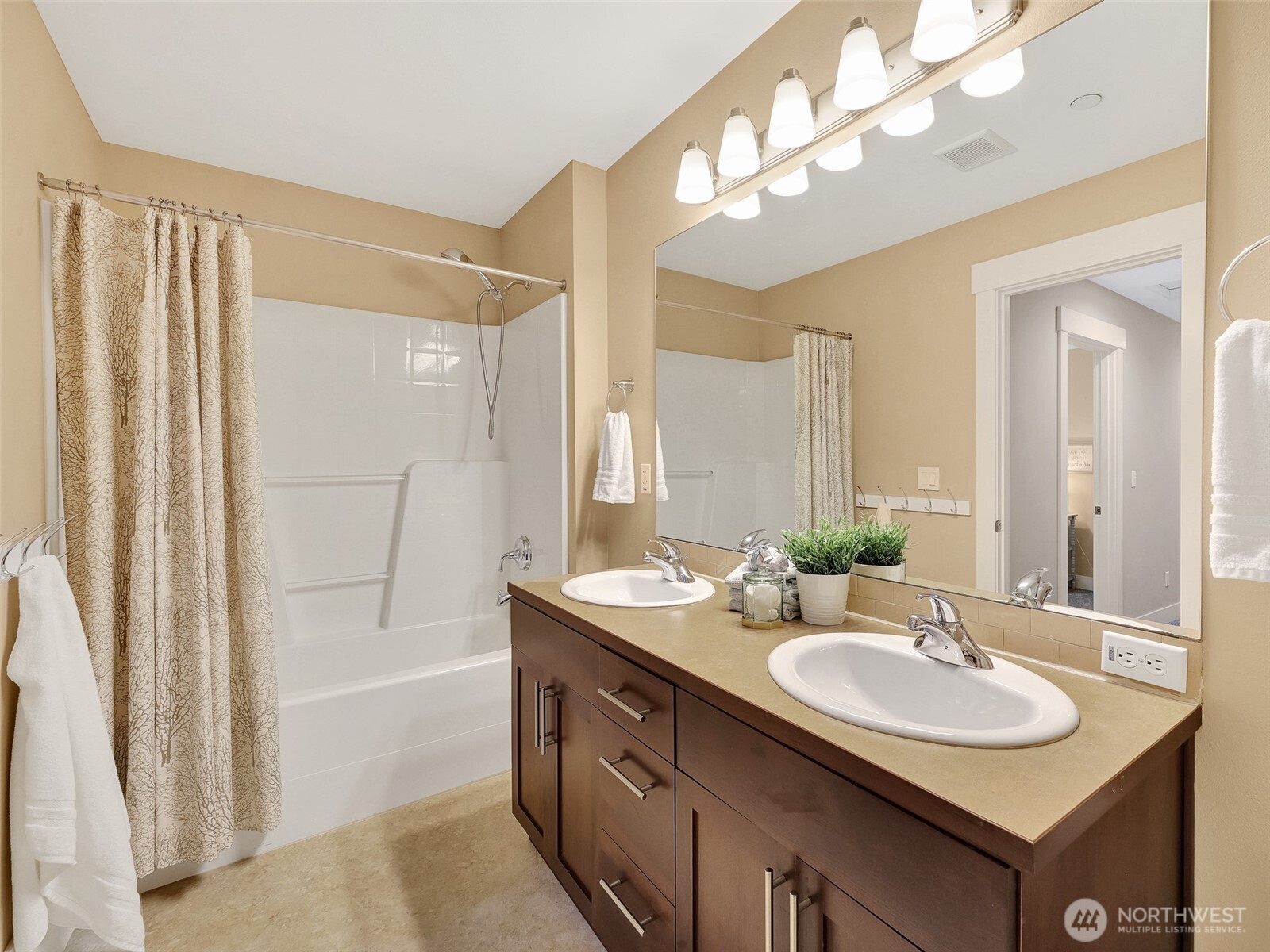 Double sink guest bath is perfect for everyday use or special guests