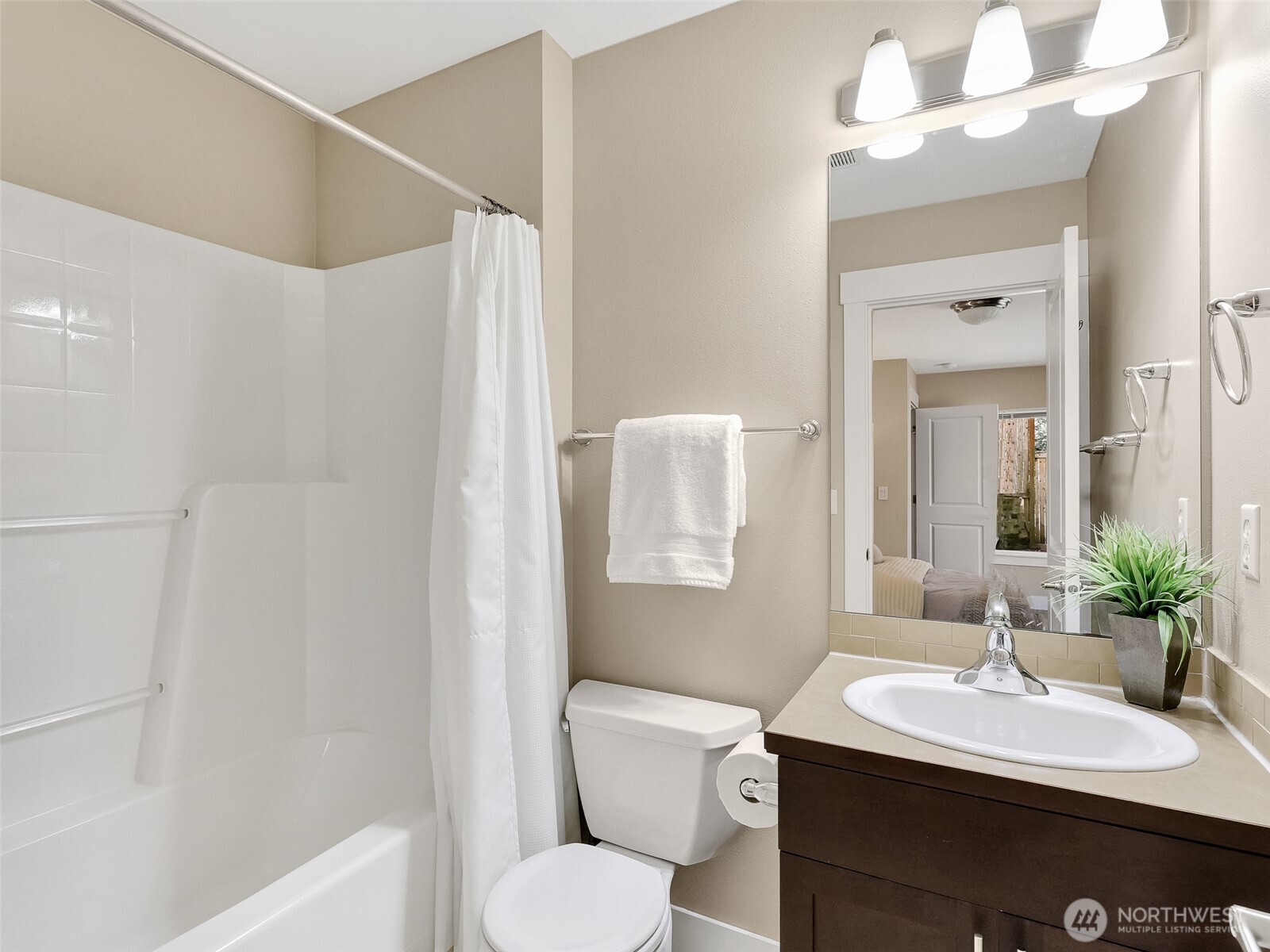Private guest bath offering convenience and separation for visitors.