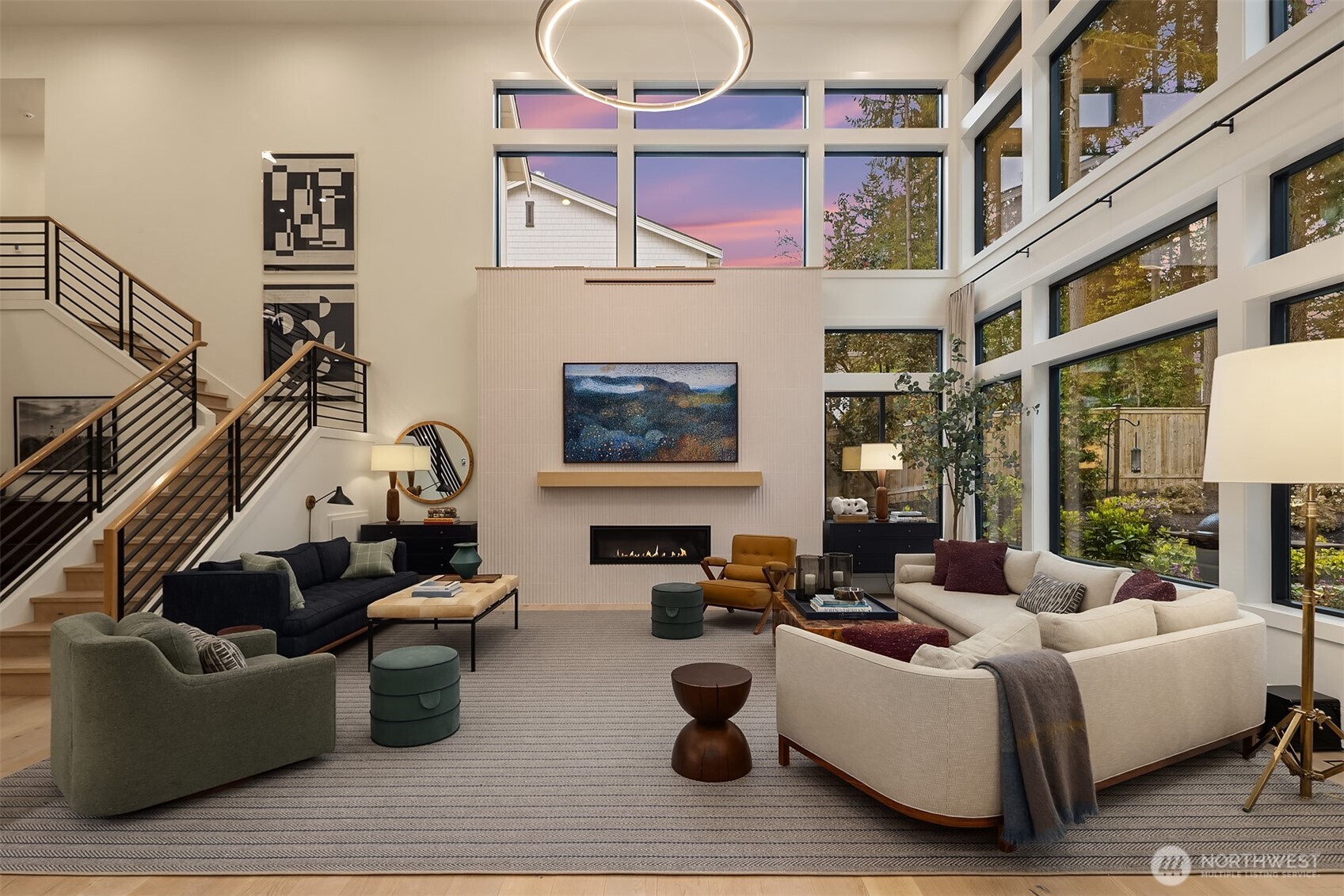 Where the day winds down — fireplace on, shoes off, the kind of room that makes it hard to remember why you ever went out.