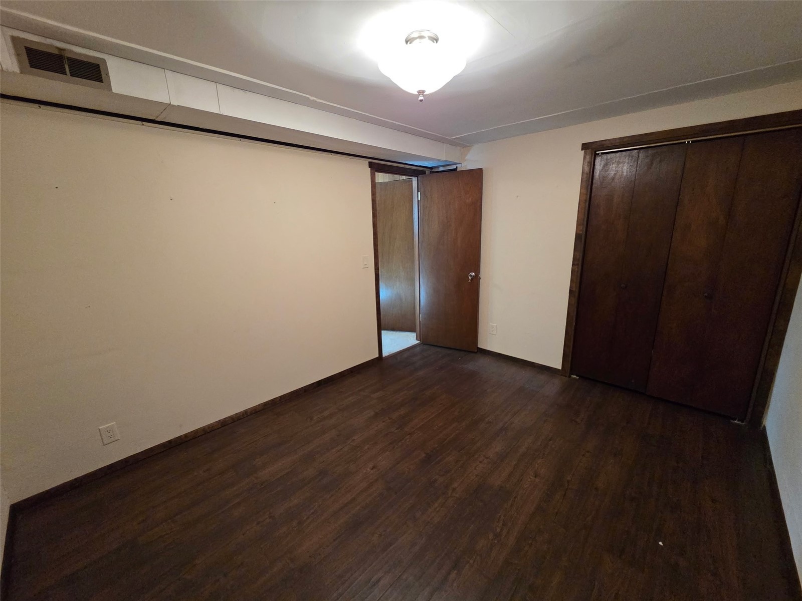 Downstairs Bonus Room and Wood Stove in Sunken Recreation Room